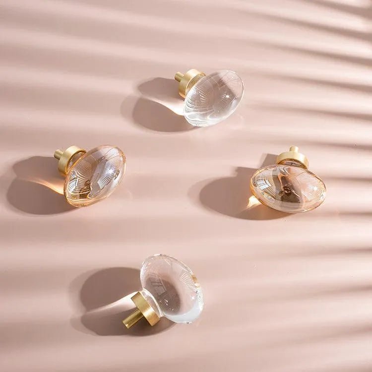 The Mantara C-0008 is a modern artificial crystal + brass knob in champange/brass, ideal for wardrobes and drawers.