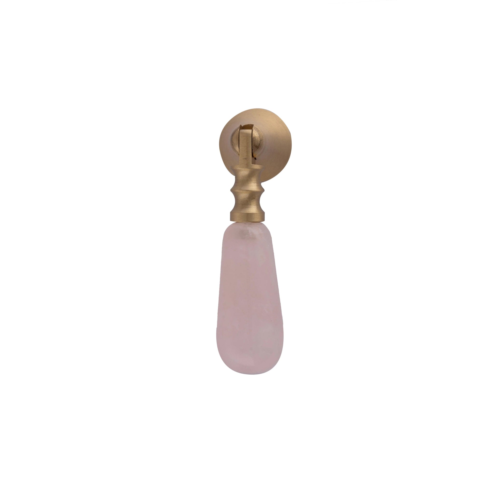 The Mantara C-0007 is a modern natural crystal + brass drop knob in pink, ideal for wardrobes and drawers.
