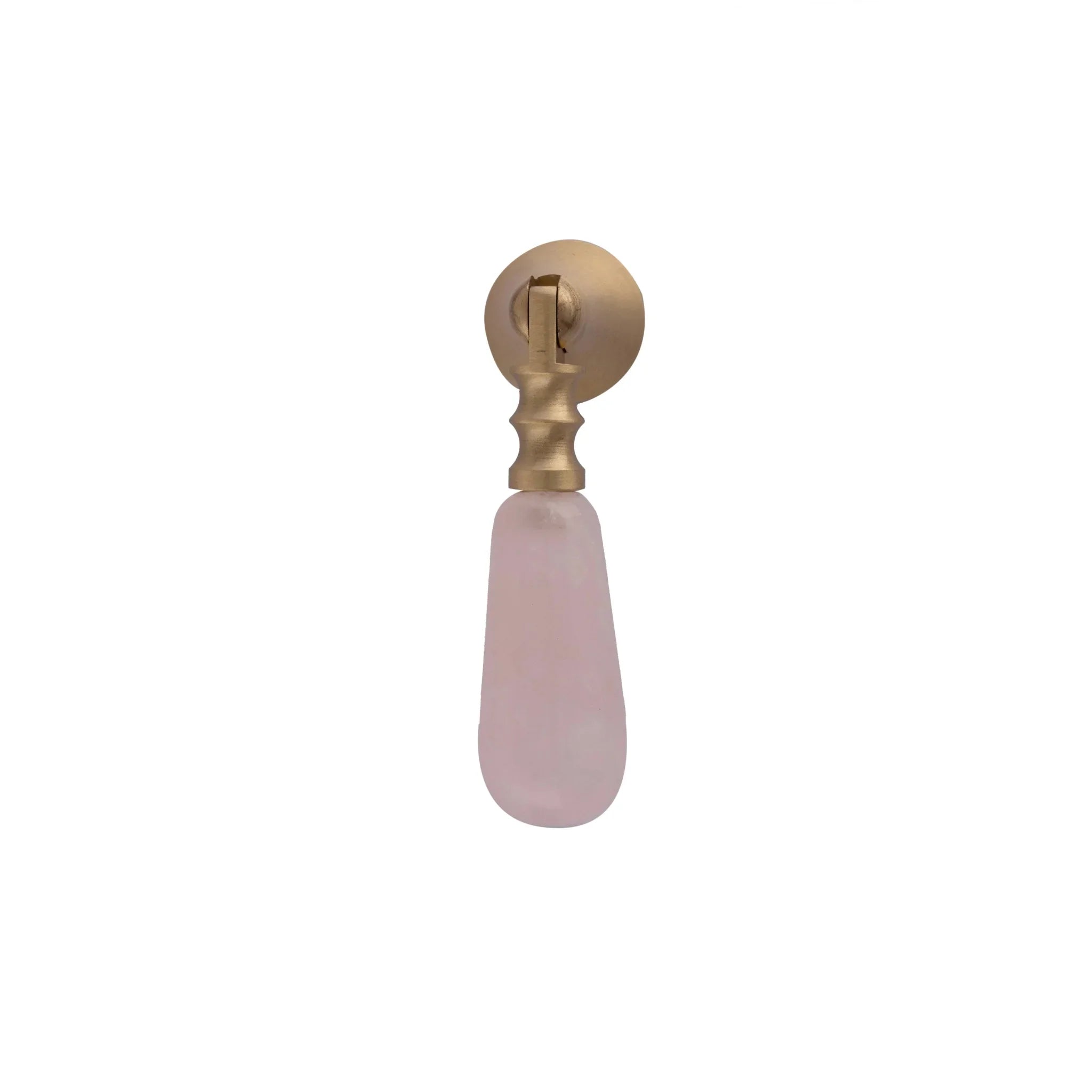 The Mantara C-0007 is a modern natural crystal + brass drop knob in pink, ideal for wardrobes and drawers.
