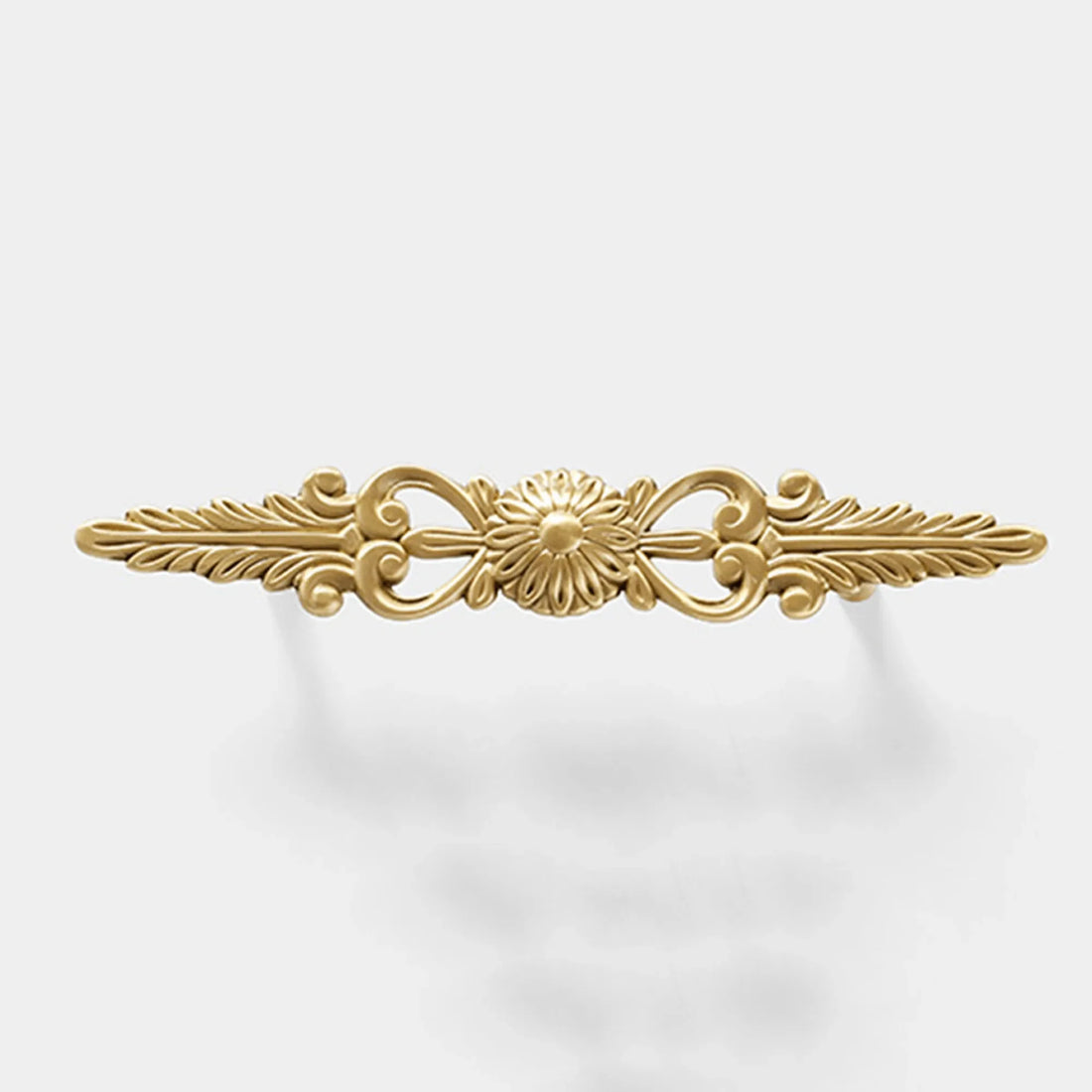 Mantara Daisy Handle B-0087 is a modern brass handle in gold, ideal for drawers, cabinets, wardrobes, and main doors.