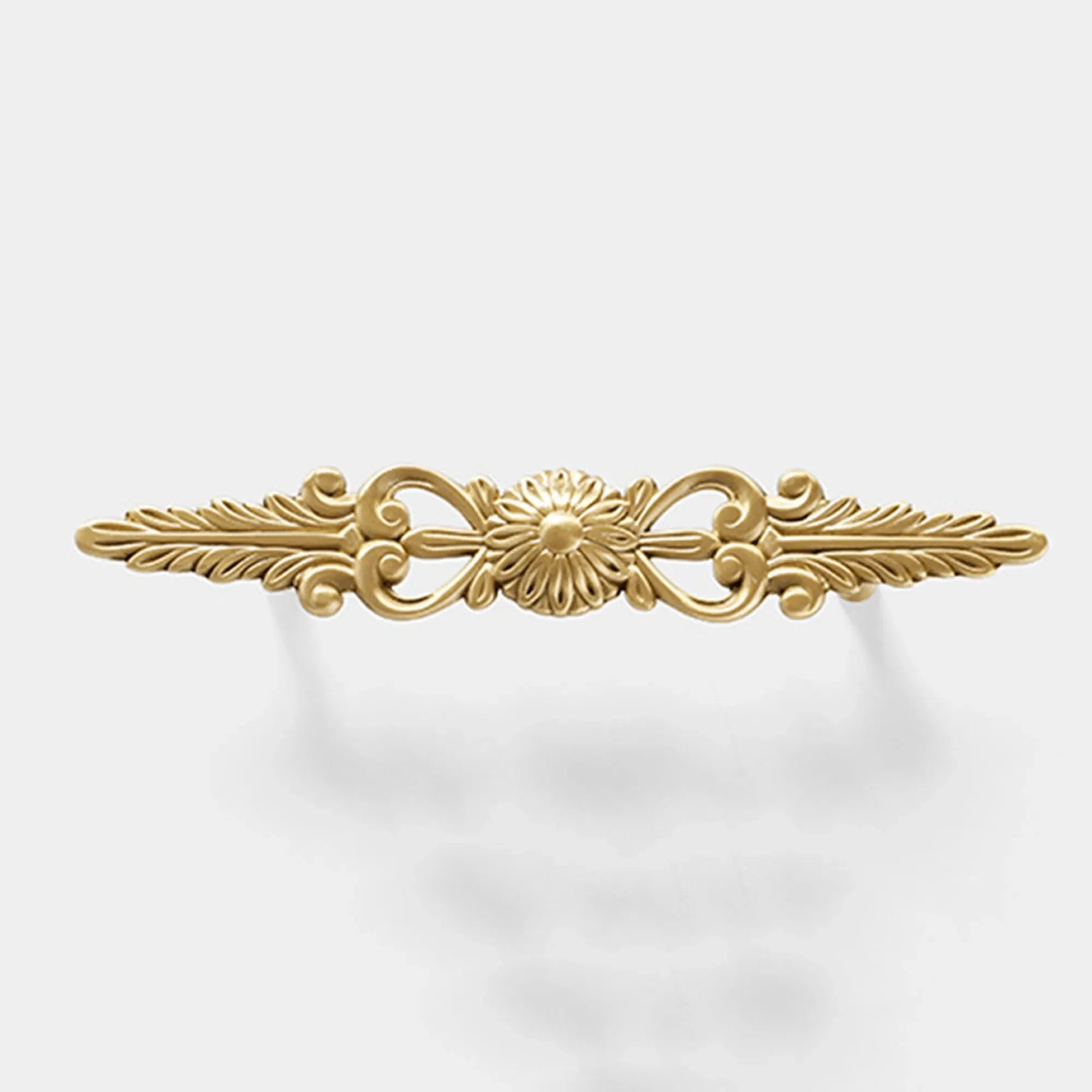 Mantara Daisy Handle B-0087 is a modern brass handle in gold, ideal for drawers, cabinets, wardrobes, and main doors.