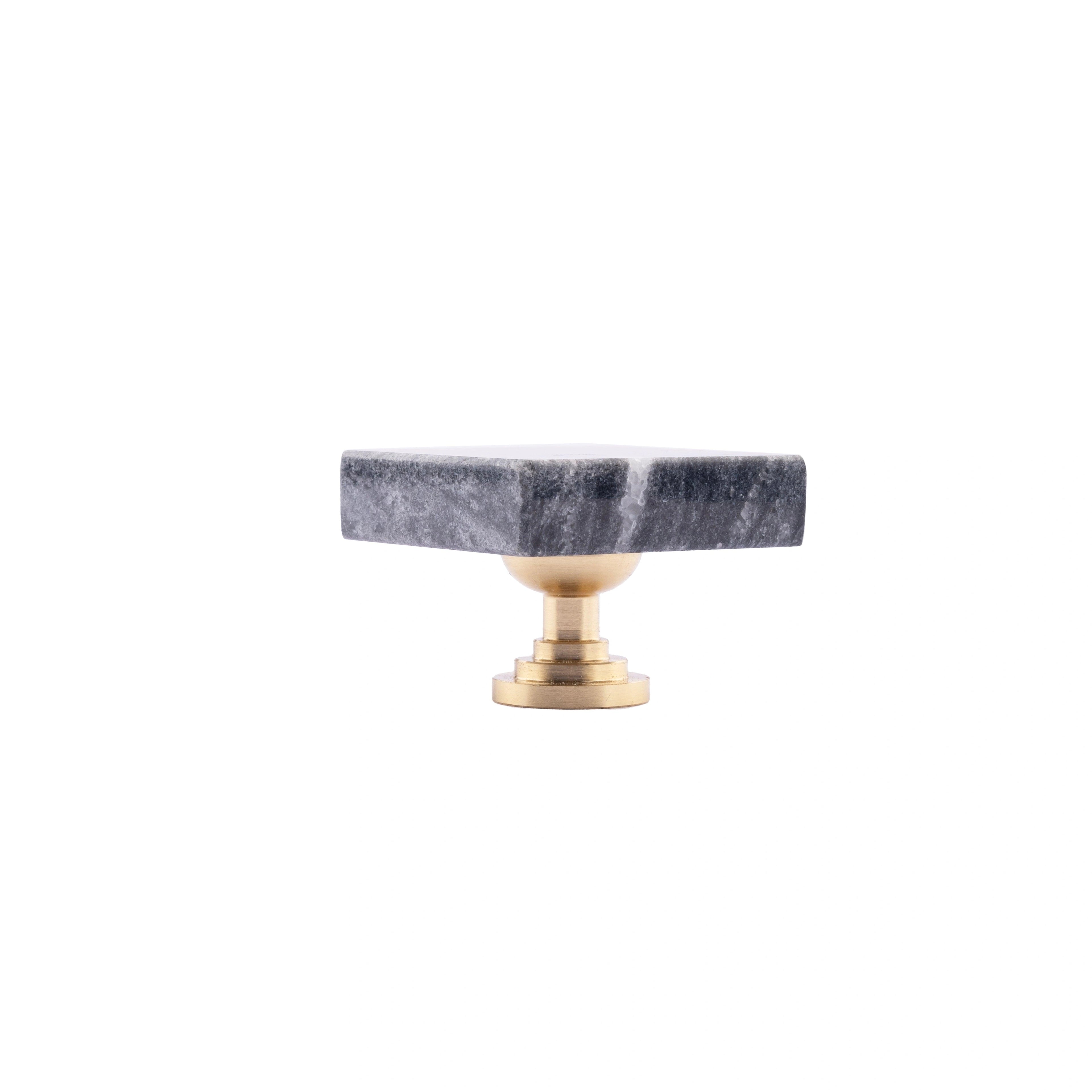 The Mantara M-0007 Diamonds Knob is a modern marble and brass square knob in grey and brass, ideal for kitchens and furniture.
