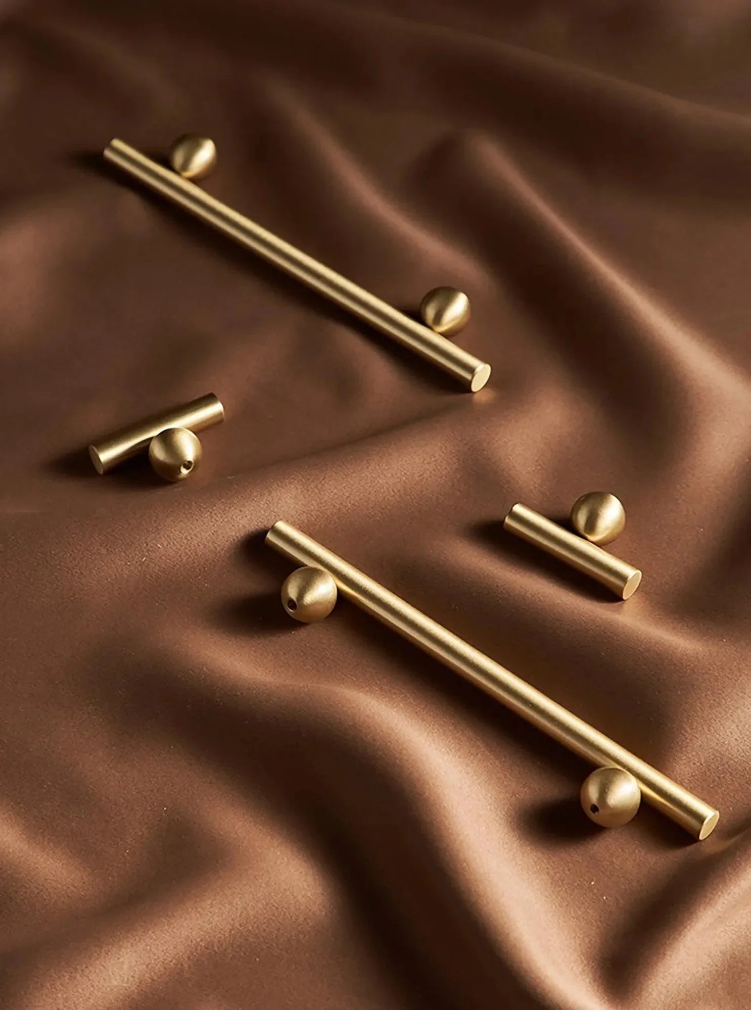Mantara Elowen T Bar Handle B-0057 is a modern brushed brass handle in matte gold, ideal for cabinets and wardrobes.