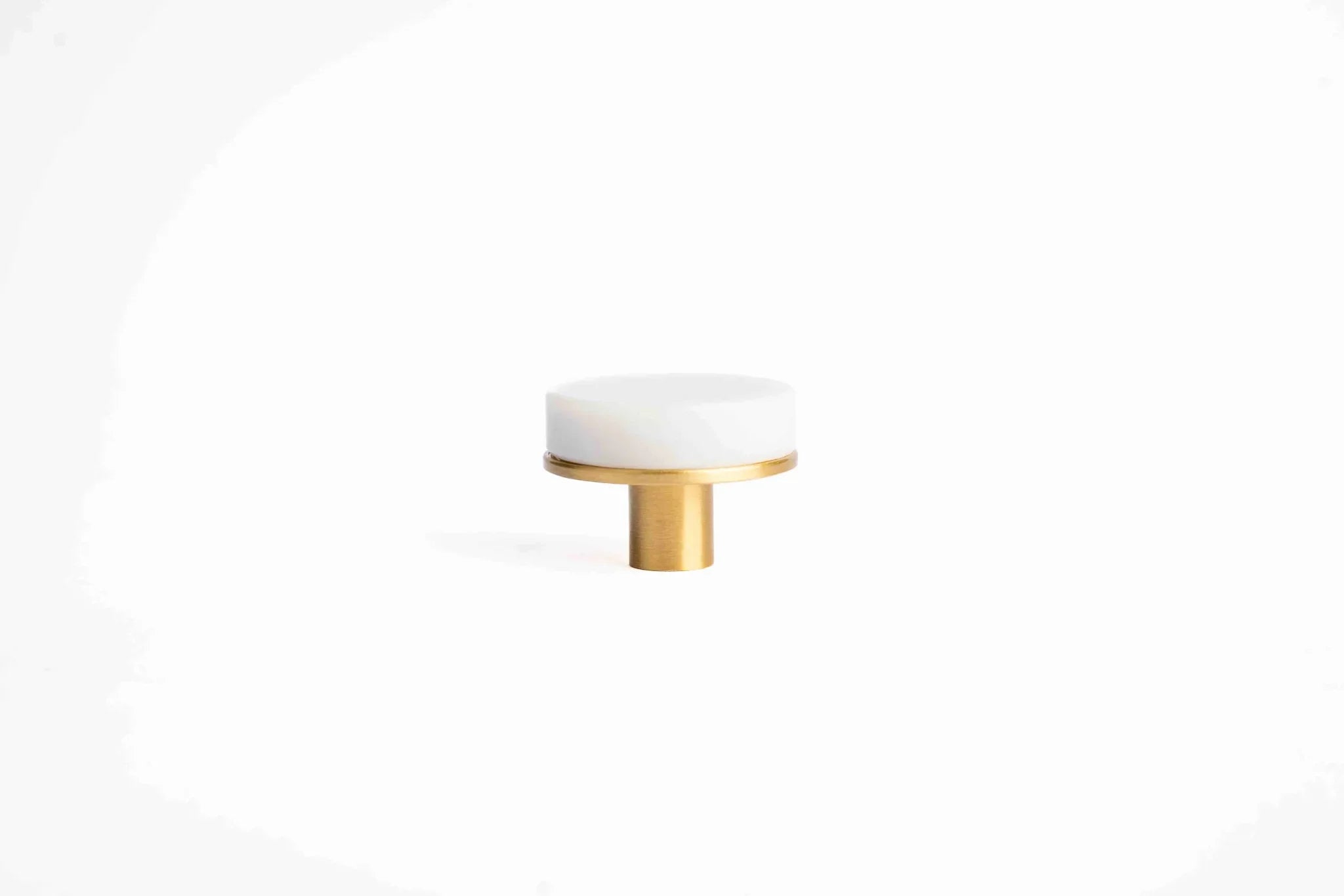Mantara Elysian Knob M-0016 is a modern marble & brass knob in white,ideal for kitchen & dresser drawers.