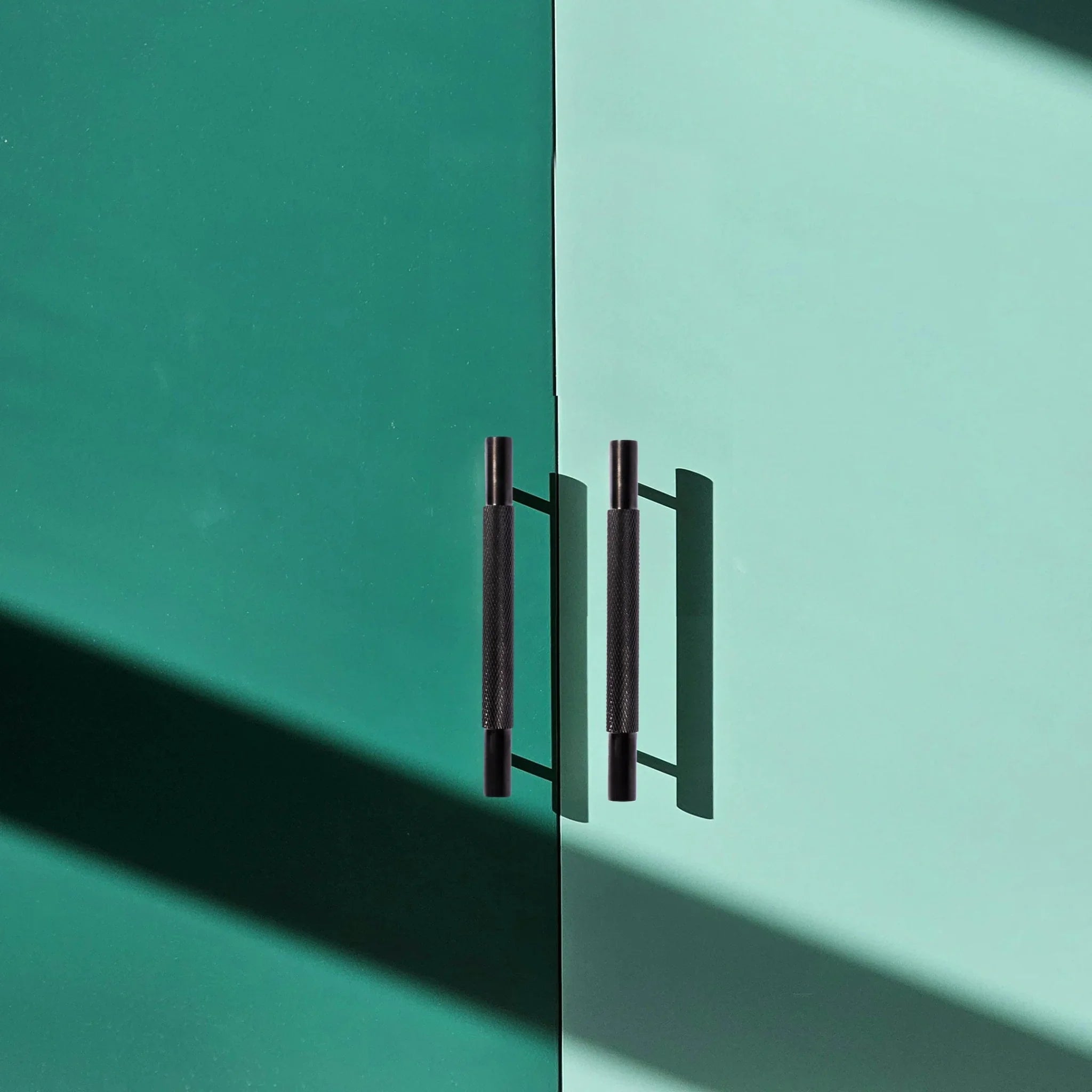 Mantara Enigma Handle B-0061 is a modern brushed brass handle in black, ideal for cupboards and drawers.