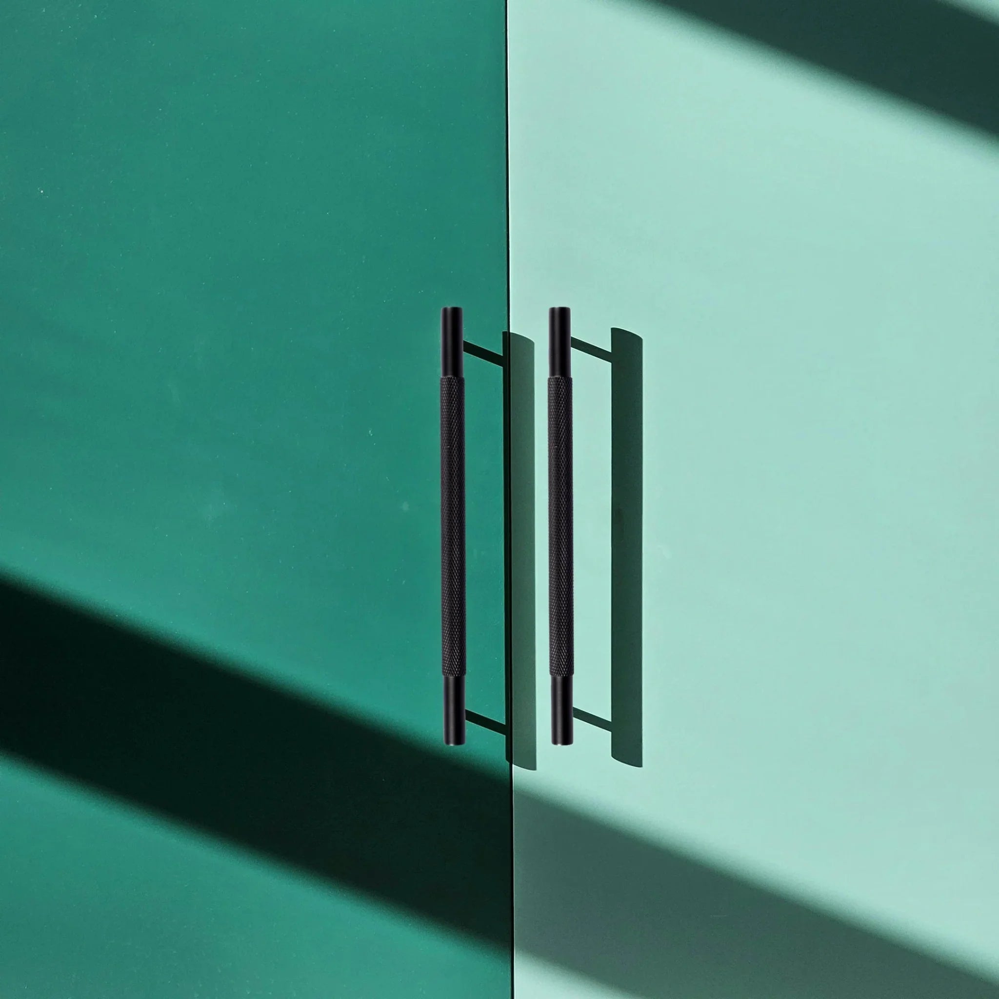 Mantara Enigma Handle B-0061 is a modern brushed brass handle in black, ideal for cupboards and drawers.