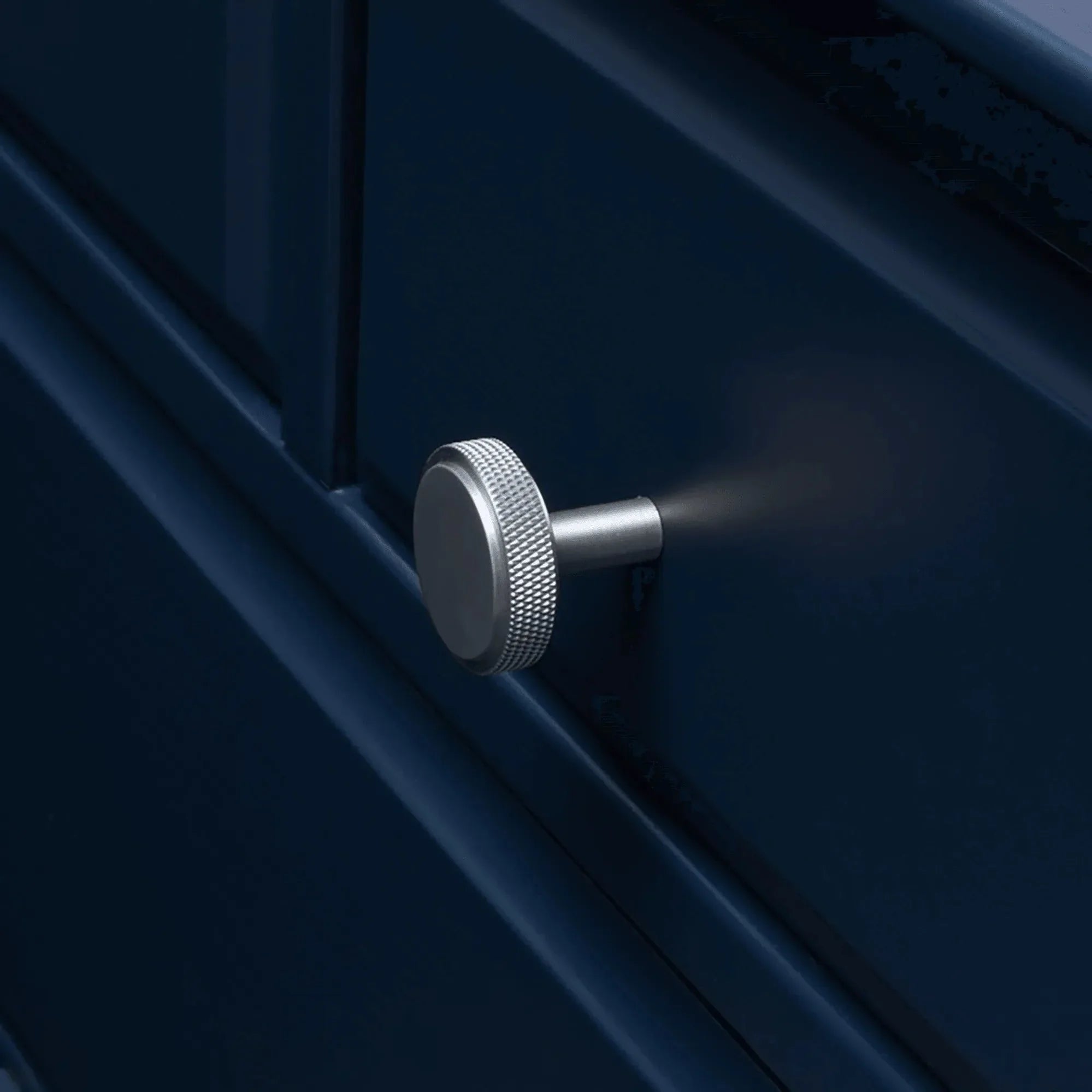 Mantara Enigma Knob B-0061 is a modern polished brass knob in black,ideal for drawers and cabinets.