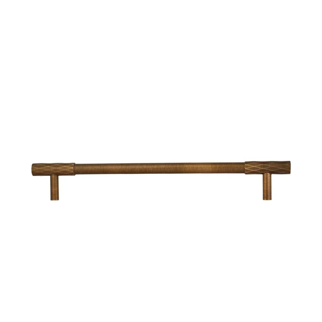 The Mantara B-0130 Ferra Handle is a modern brass handle in bronze finish, perfect for kitchen drawers, cabinets, and furniture.