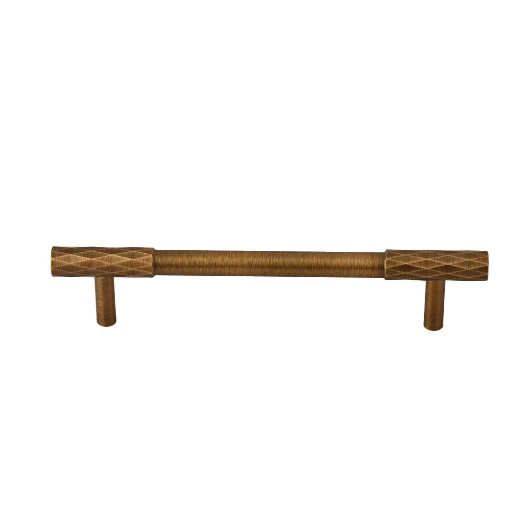 The Mantara B-0130 Ferra Handle is a modern brass handle in bronze finish, perfect for kitchen drawers, cabinets, and furniture.