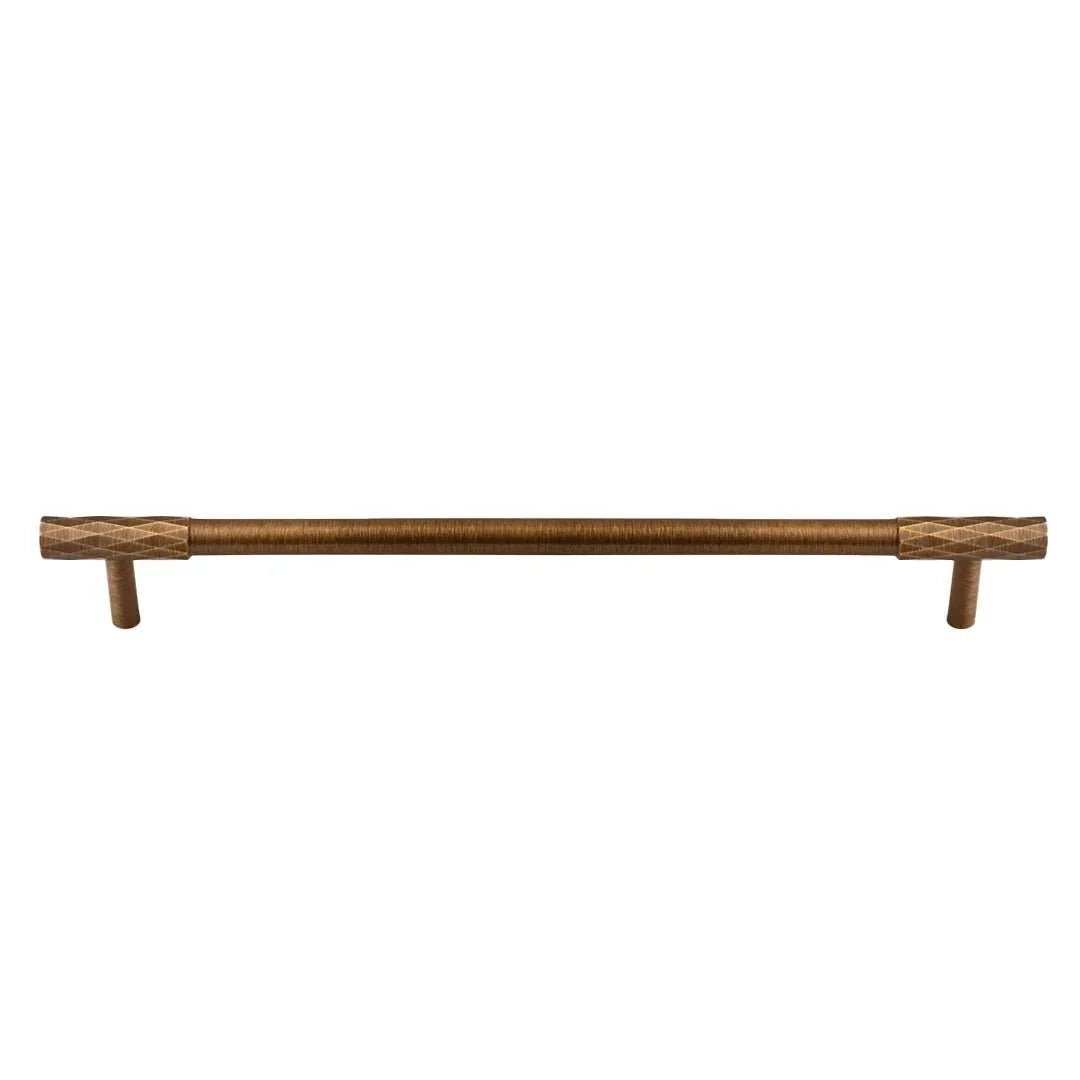 The Mantara B-0130 Ferra Handle is a modern brass handle in bronze finish, perfect for kitchen drawers, cabinets, and furniture.