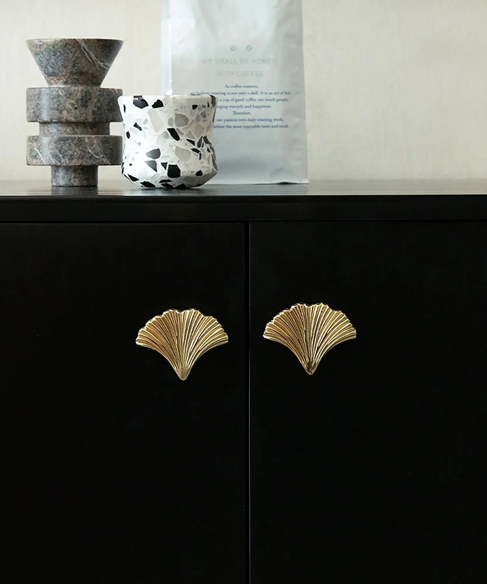 The Mantara B-0014 Floret Knob is a modern solid brass knob in brushed gold, ideal for doors, cabinets, and furniture.