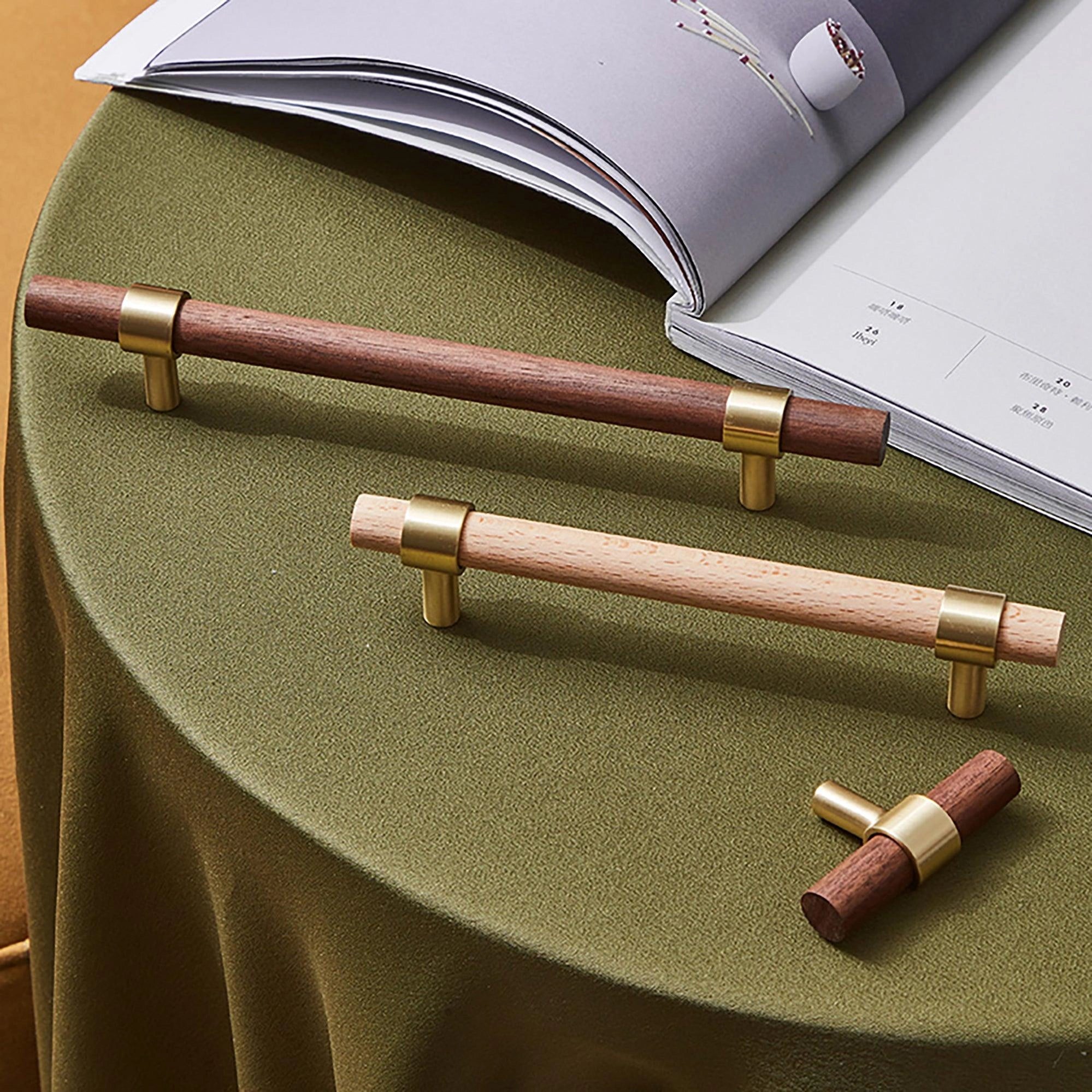 Mantara Holt Handle W-0010 is a modern walnut wood & brass handle in dark brown with brushed finish, ideal for wardrobes & drawers.