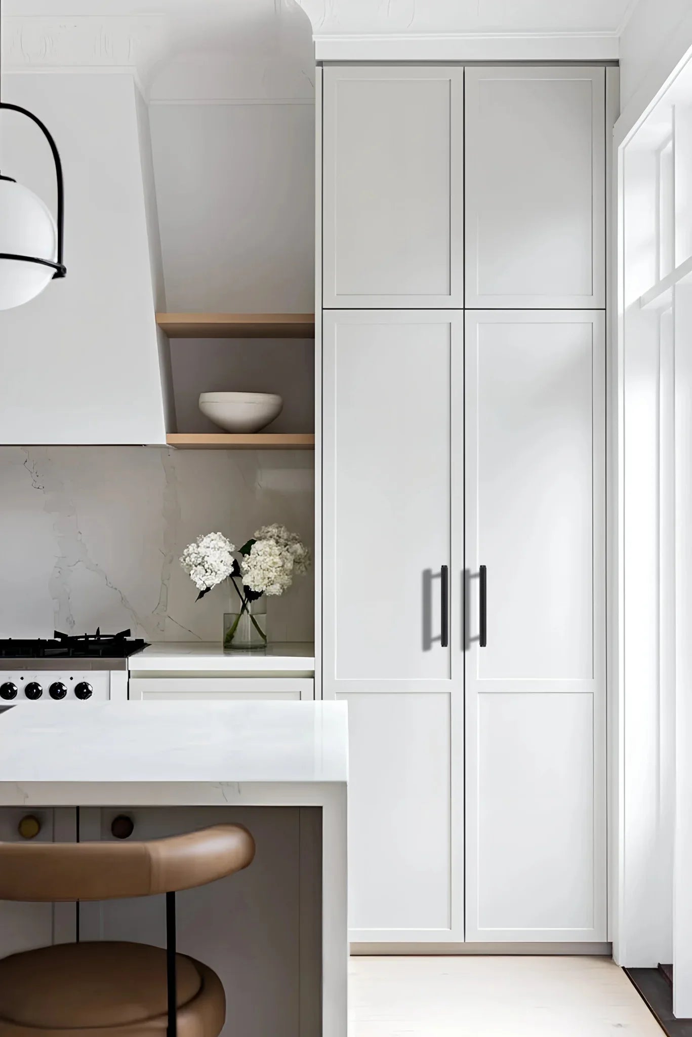 The Mantara AL-0013 Inez Handle is a modern black aluminum handle with a brushed finish, perfect for kitchens, drawers, and cabinets.