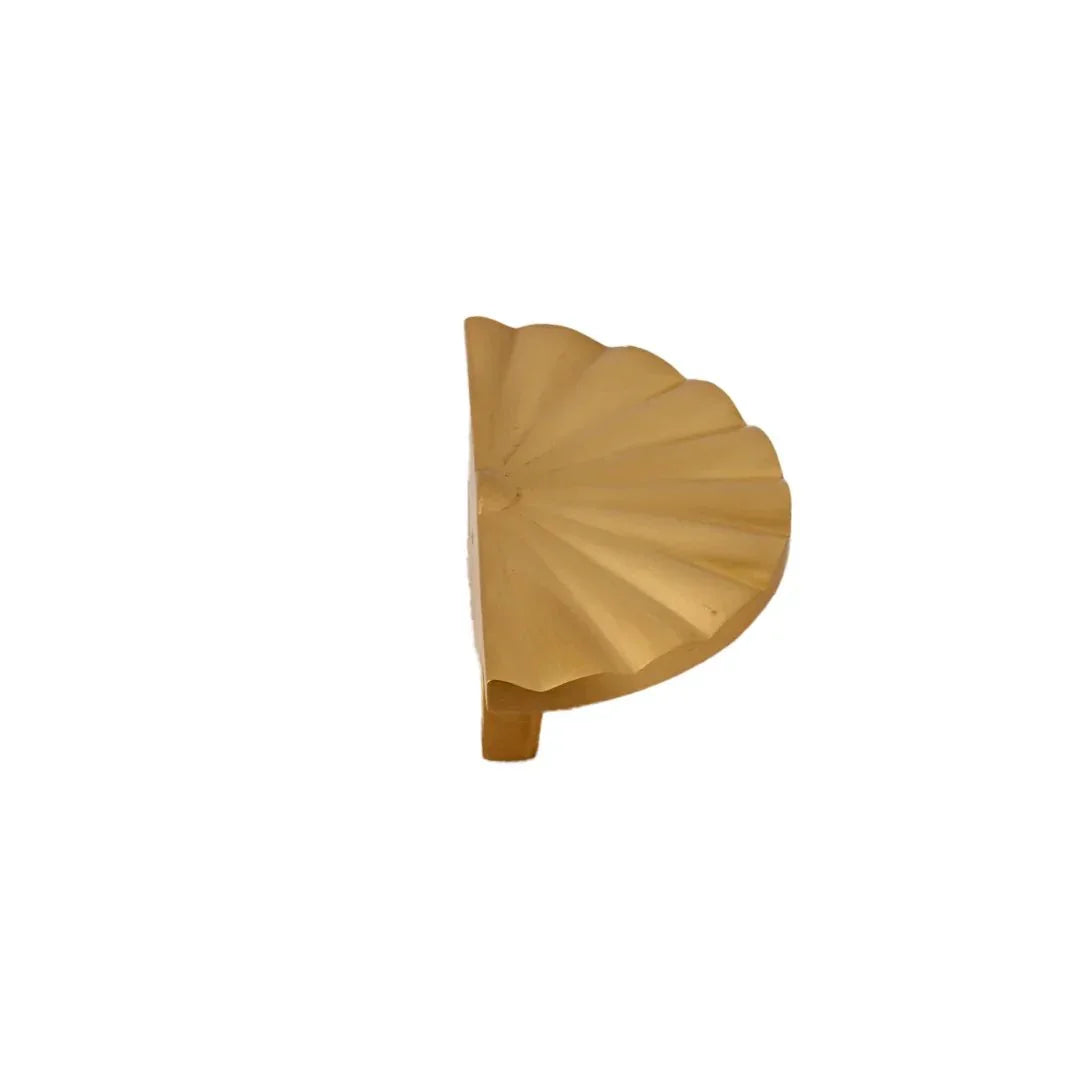 The Mantara B-0029 Kanti Knob is a modern brass handle in gold brushed finish, perfect for doors, drawers, and cabinets.
