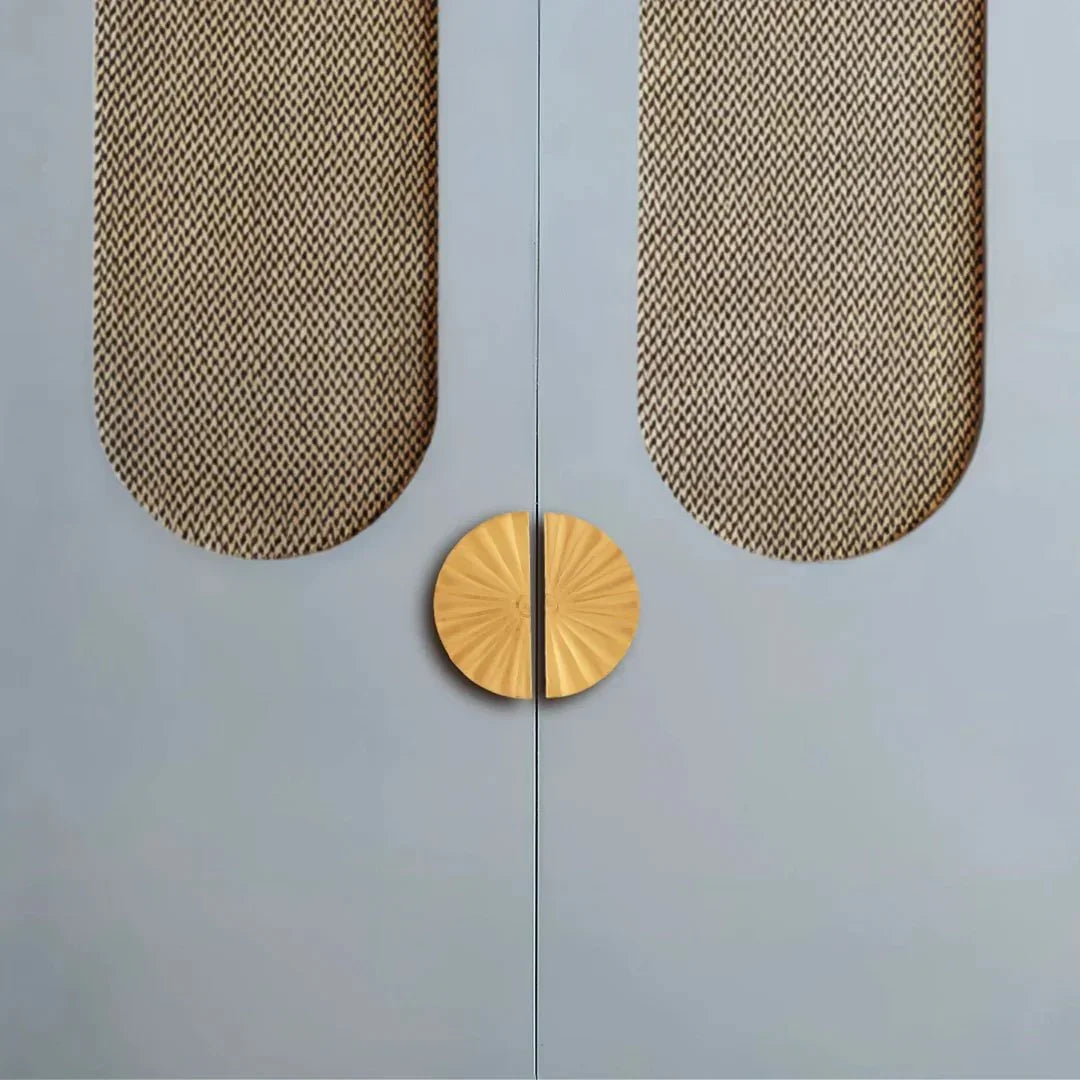 The Mantara B-0029 Kanti Knob is a modern brass handle in gold brushed finish, perfect for doors, drawers, and cabinets.