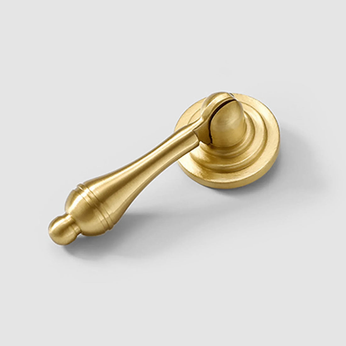 The Mantara B-0041 Legacy Drop Knob is a modern brushed brass knob in gold, ideal for furniture, cabinets, bedrooms, and kitchens.