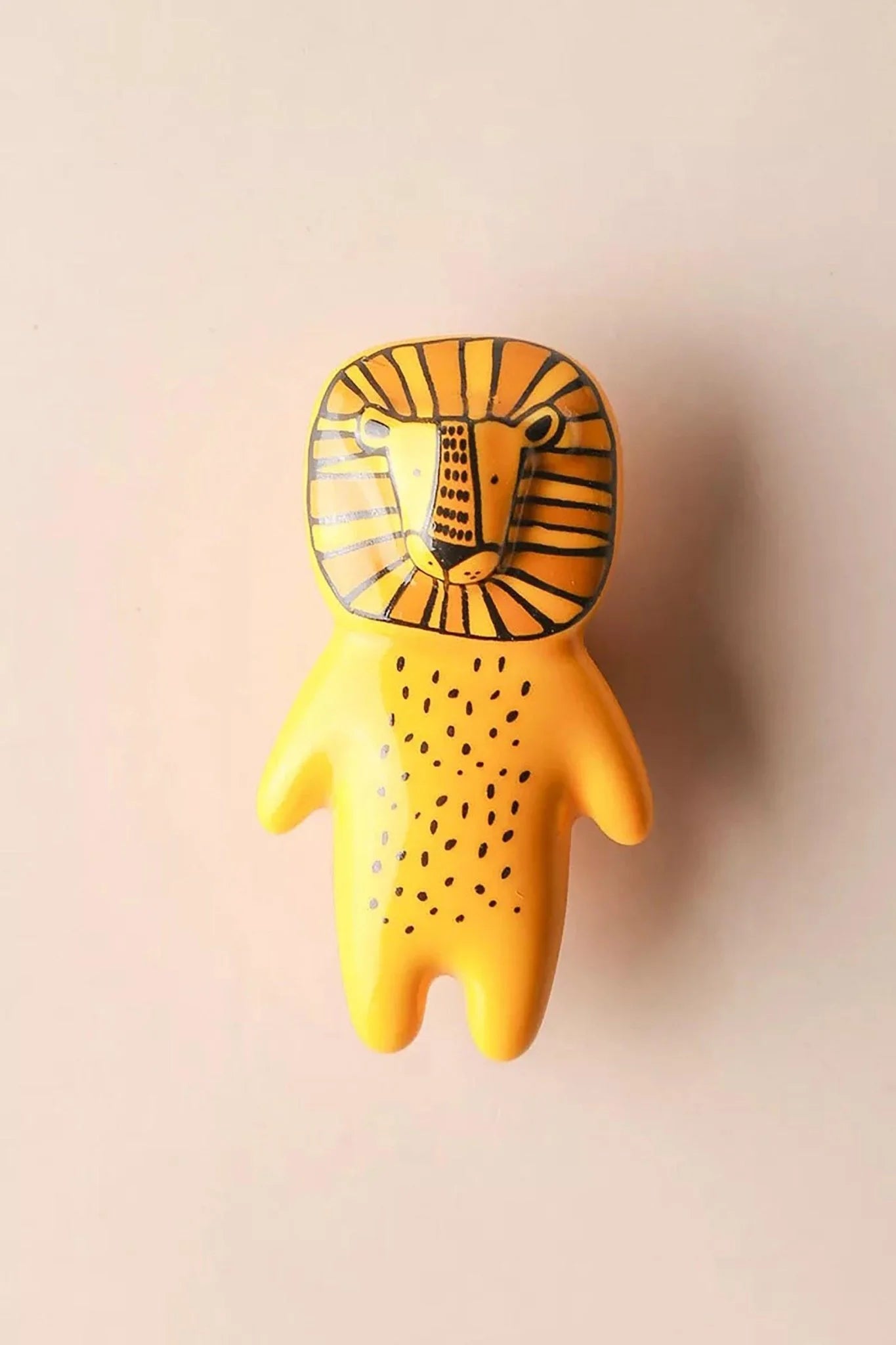The Mantara CR-0001-Lion Knob is a modern yellow ceramic knob with a polished finish, ideal for wardrobes, cabinets, and kids&