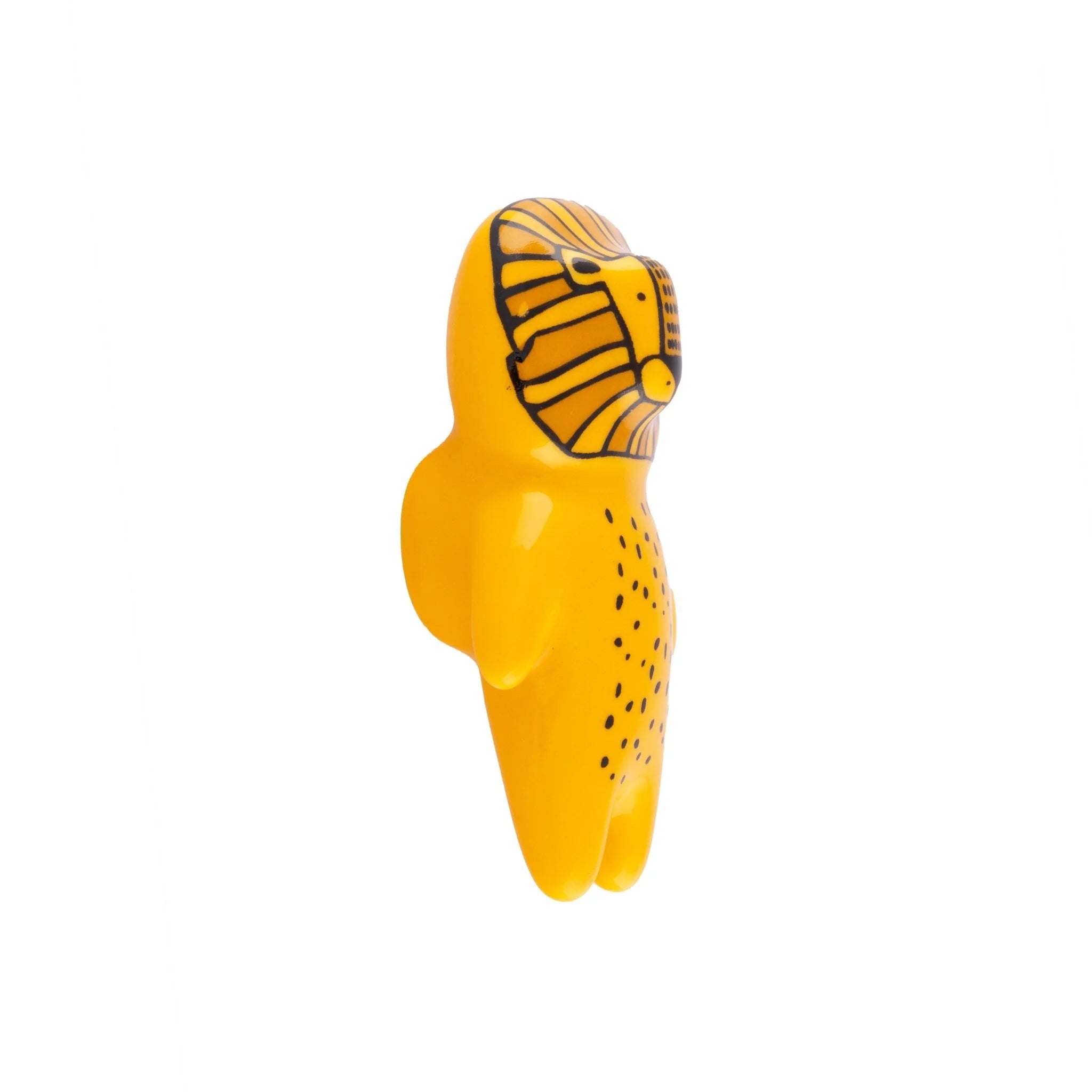 The Mantara CR-0001-Lion Knob is a modern yellow ceramic knob with a polished finish, ideal for wardrobes, cabinets, and kids&