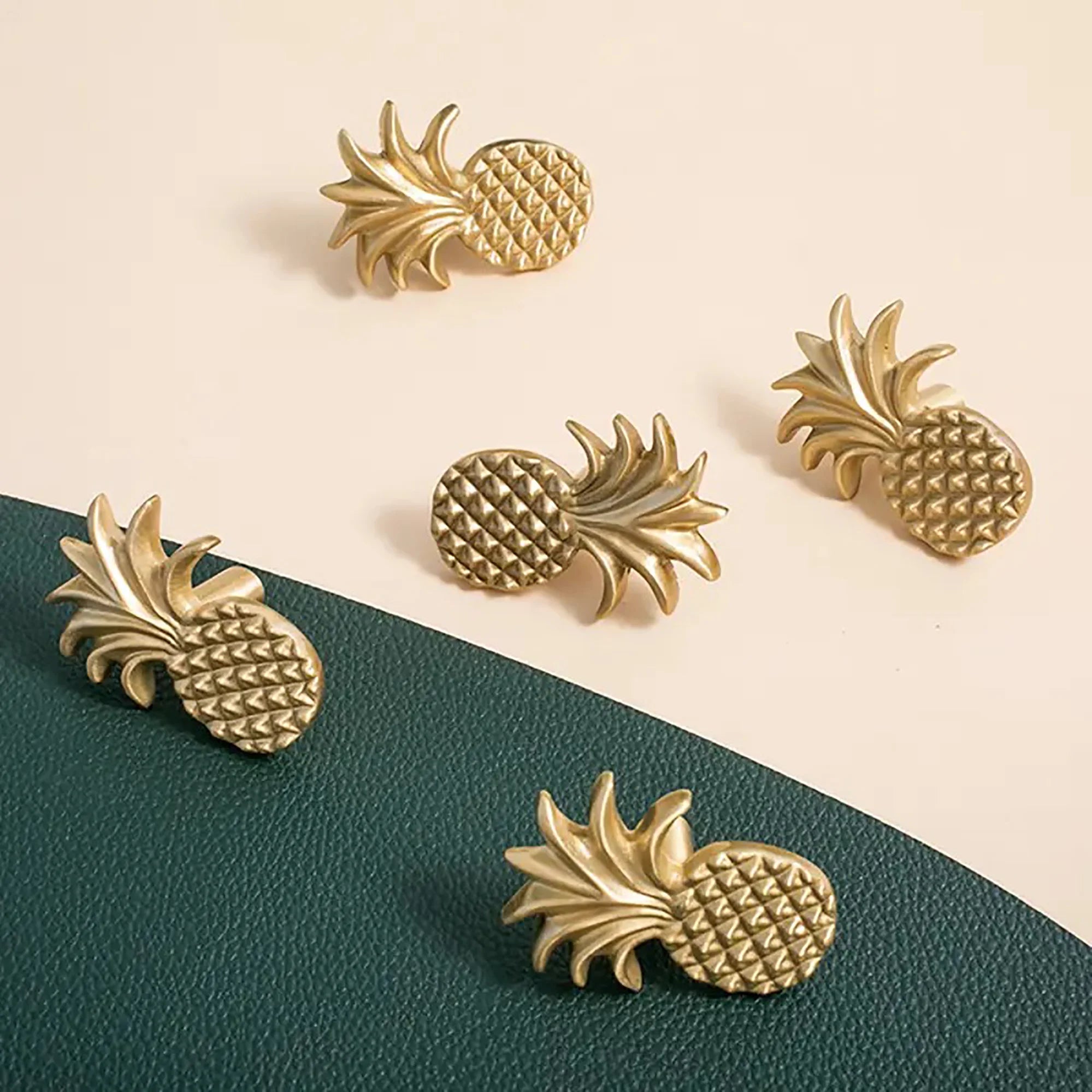 The Ananas Knob by Mantara B-0110 is a modern brushed brass knob in gold, ideal for dressers, cabinets, and kitchens.