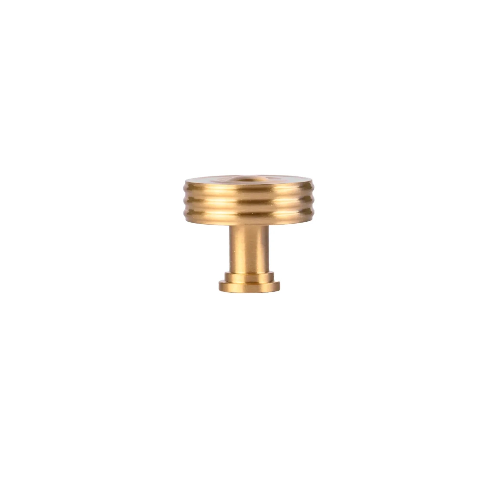 The Mantara B-0121 is a modern brass knob in gold with a brushed finish, ideal for kitchen drawers and dressers.