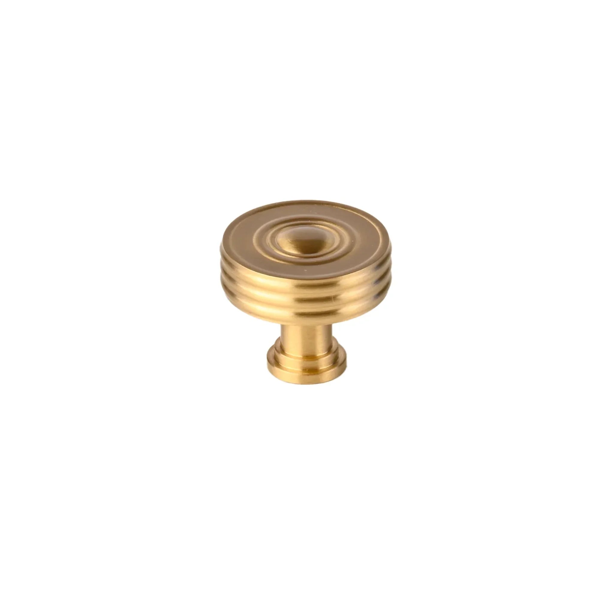 The Mantara B-0121 is a modern brass knob in gold with a brushed finish, ideal for kitchen drawers and dressers.