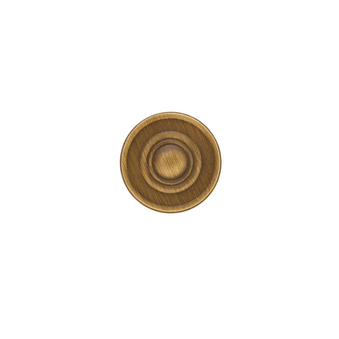 The Mantara B-0121 is a modern brass knob in bronze with a brushed finish, ideal for kitchen drawers and dressers.