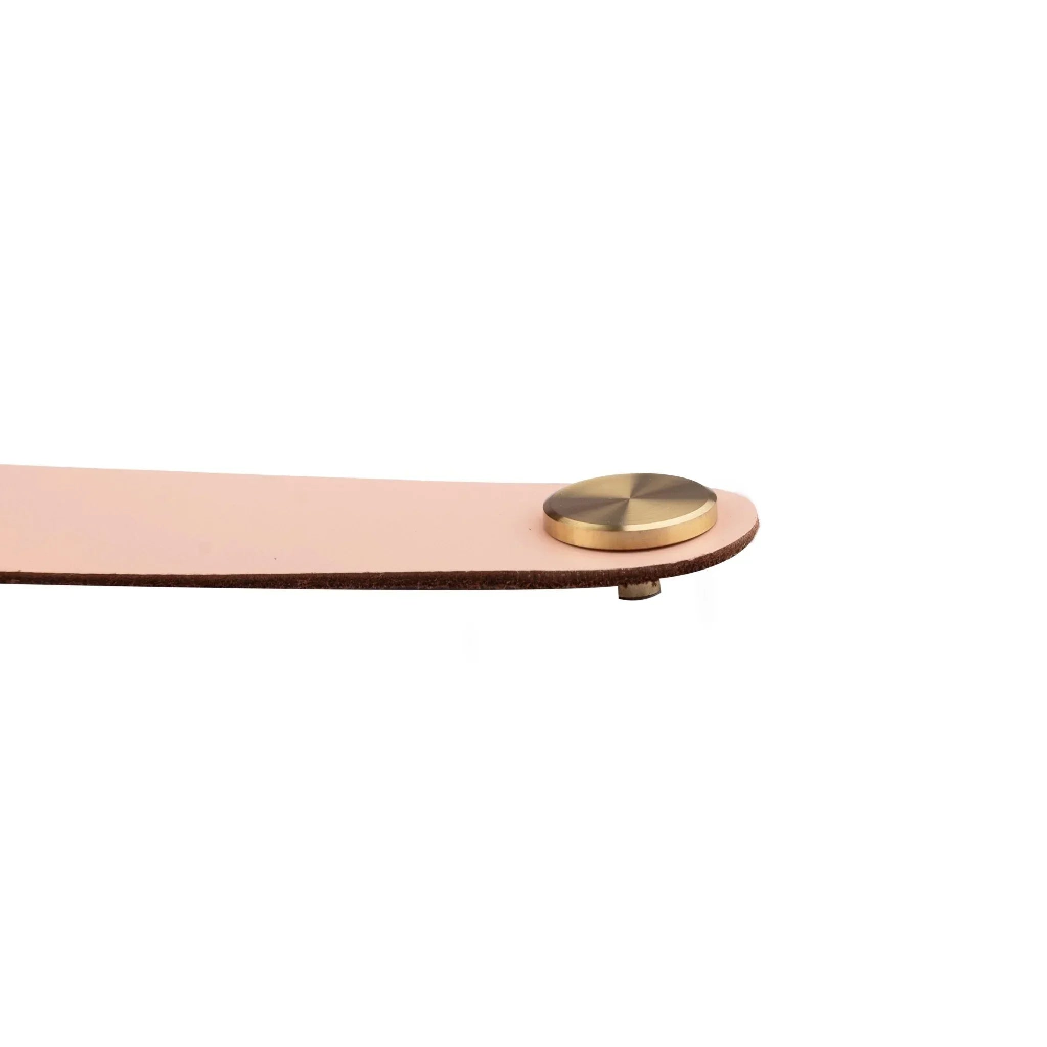 The Mantara L-0001-160 Maverick Handle is a Nordic leather and brass handle in pink, ideal for kitchens and wardrobes.