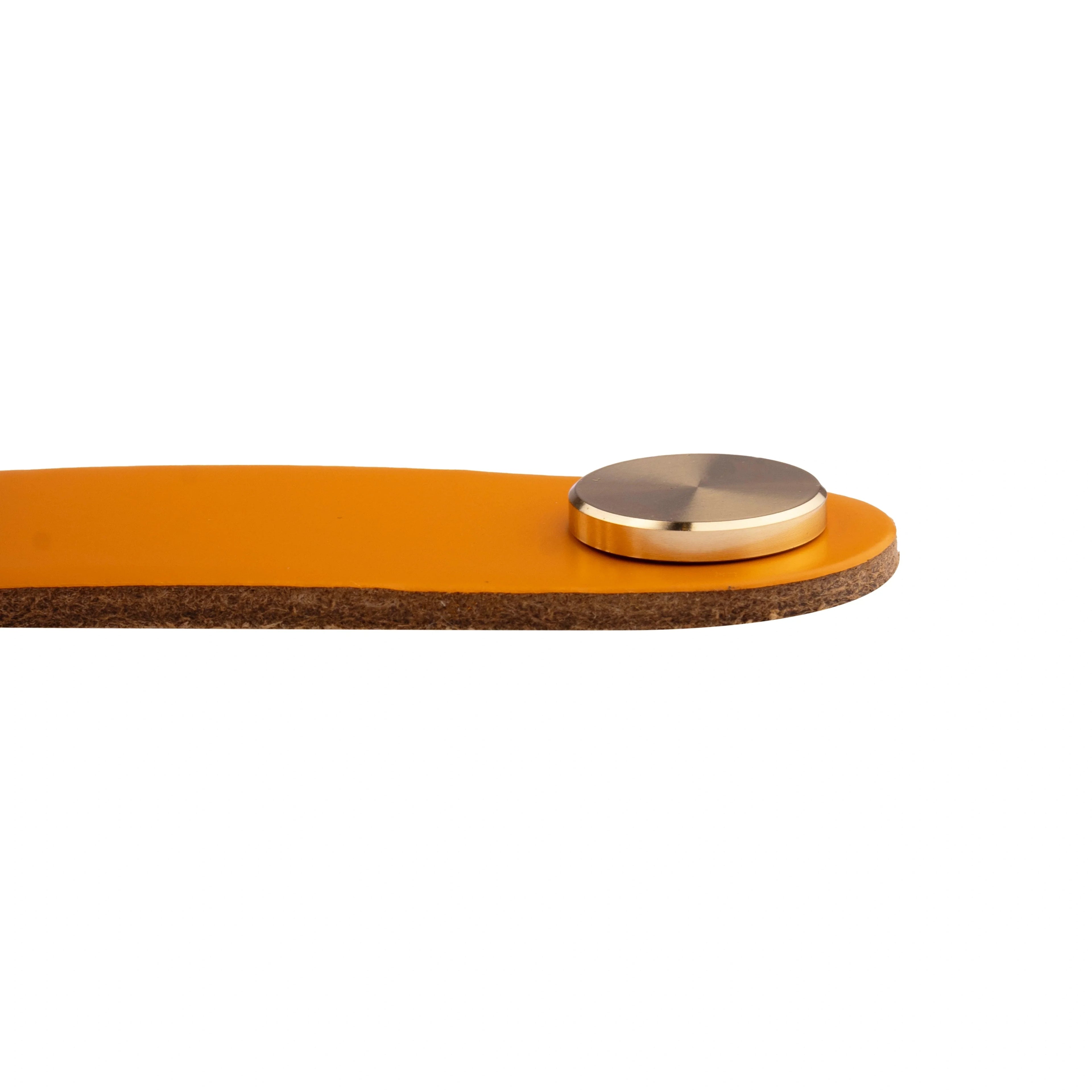 The Mantara L-0001-160 Maverick Handle is a Nordic leather and brass handle in orange, ideal for kitchens and wardrobes.