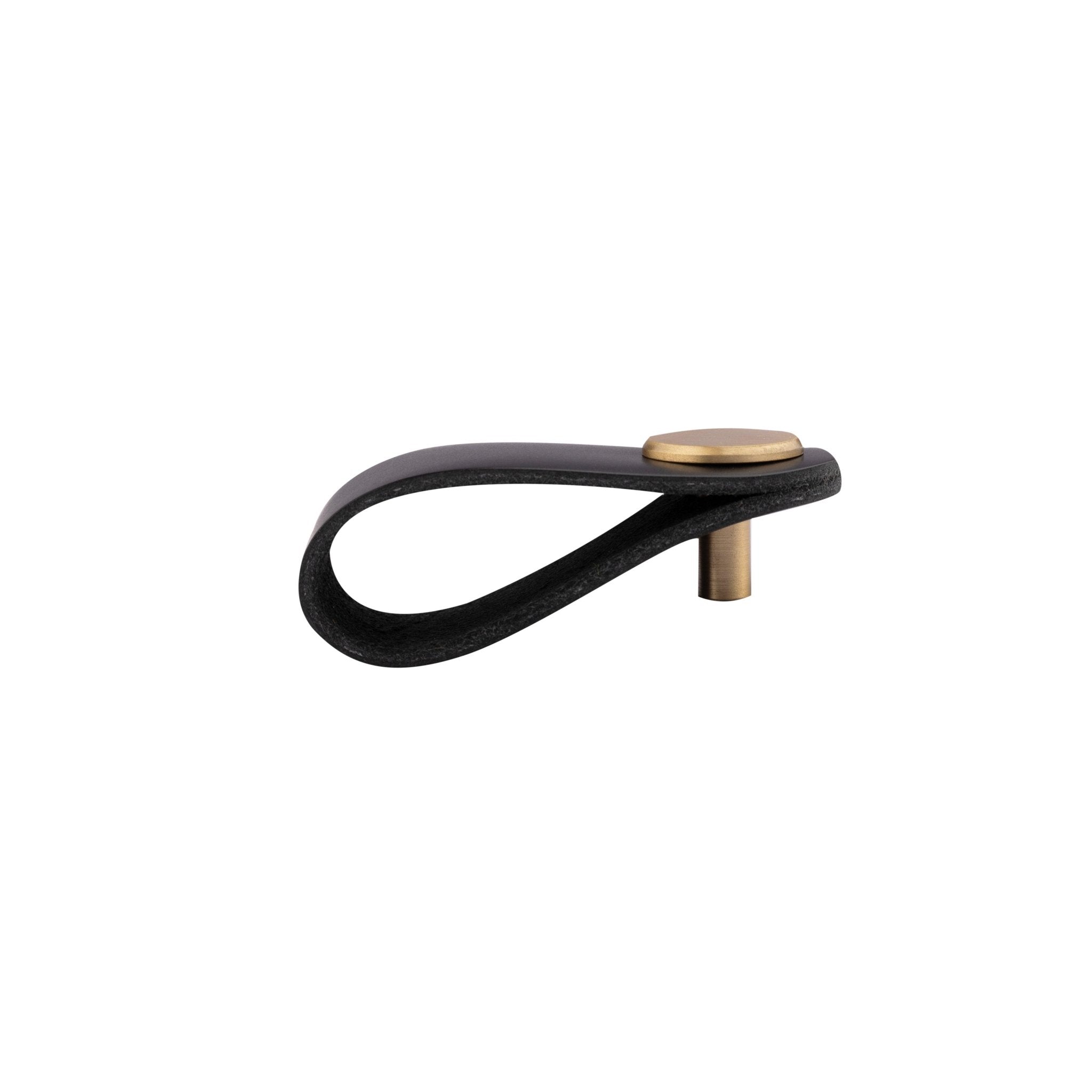 The Mantara L-0001 Maverick Pull Knob is a Nordic leather and brass knob in black, ideal for kitchens and furniture.