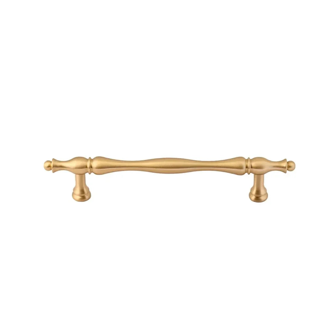 The Mantara B-0125 Miren Handle is a modern brass handle in bronze and gold, ideal for kitchen drawers, cabinets, and furniture.