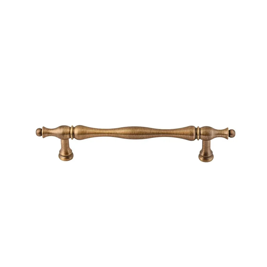 The Mantara B-0125 Miren Handle is a modern brass handle in bronze and gold, ideal for kitchen drawers, cabinets, and furniture.