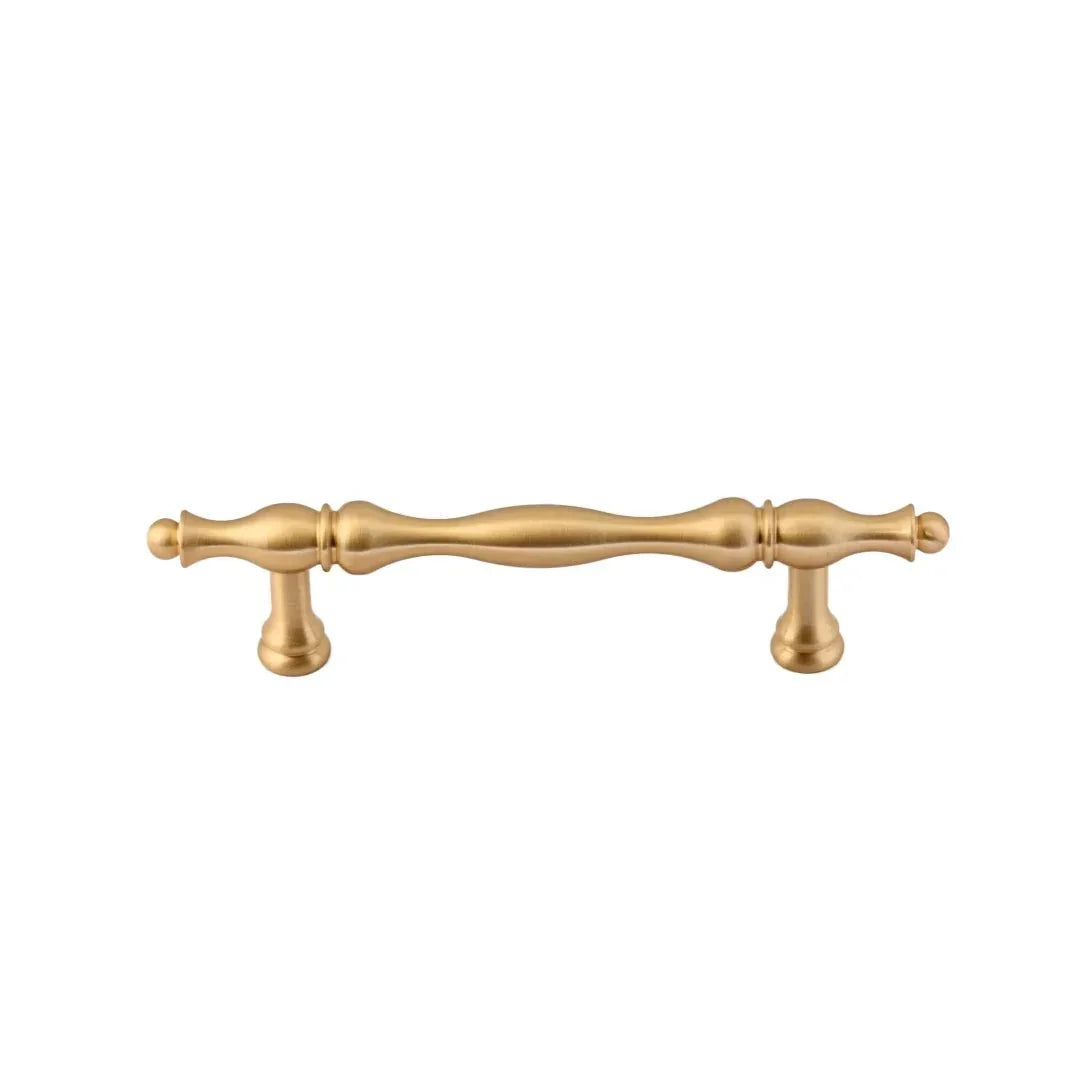 The Mantara B-0125 Miren Handle is a modern brass handle in bronze and gold, ideal for kitchen drawers, cabinets, and furniture.