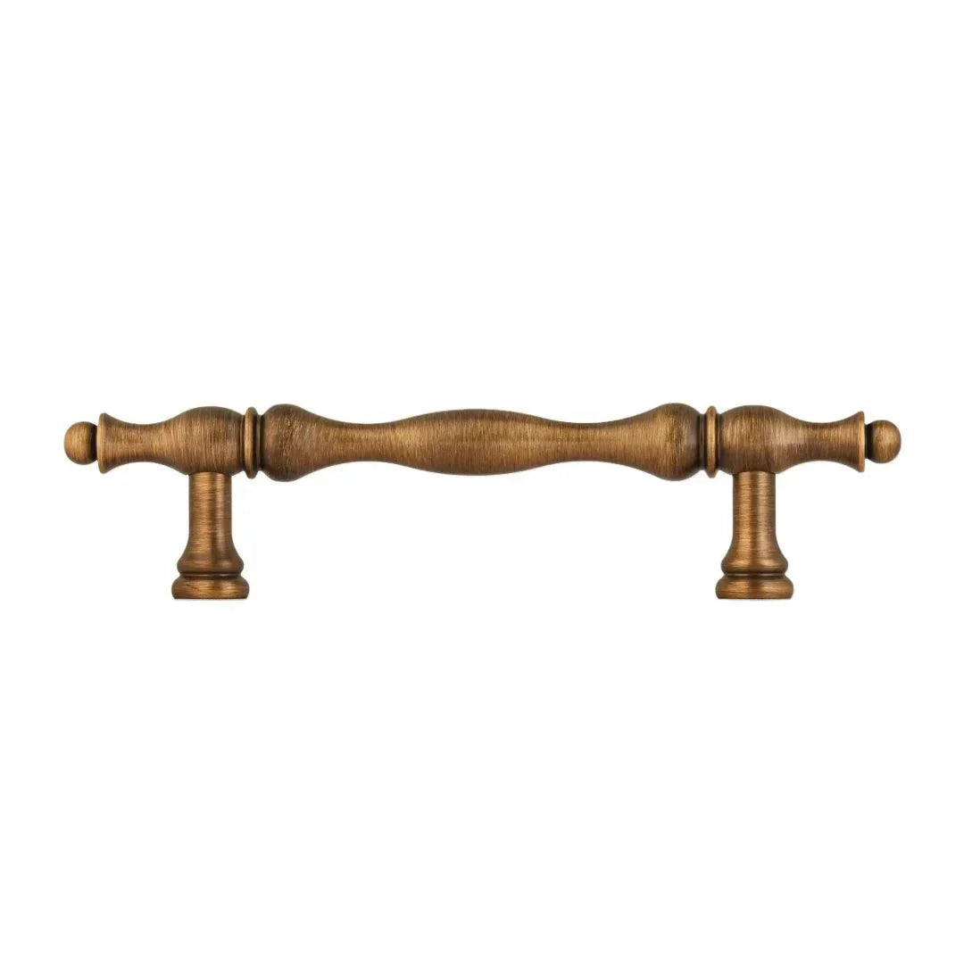 The Mantara B-0125 Miren Handle is a modern brass handle in bronze and gold, ideal for kitchen drawers, cabinets, and furniture.