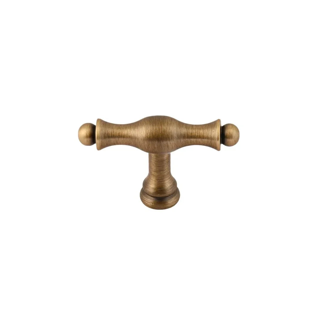 The Mantara B-0125 Miren Handle is a modern brass handle in bronze and gold, ideal for kitchen drawers, cabinets, and furniture.