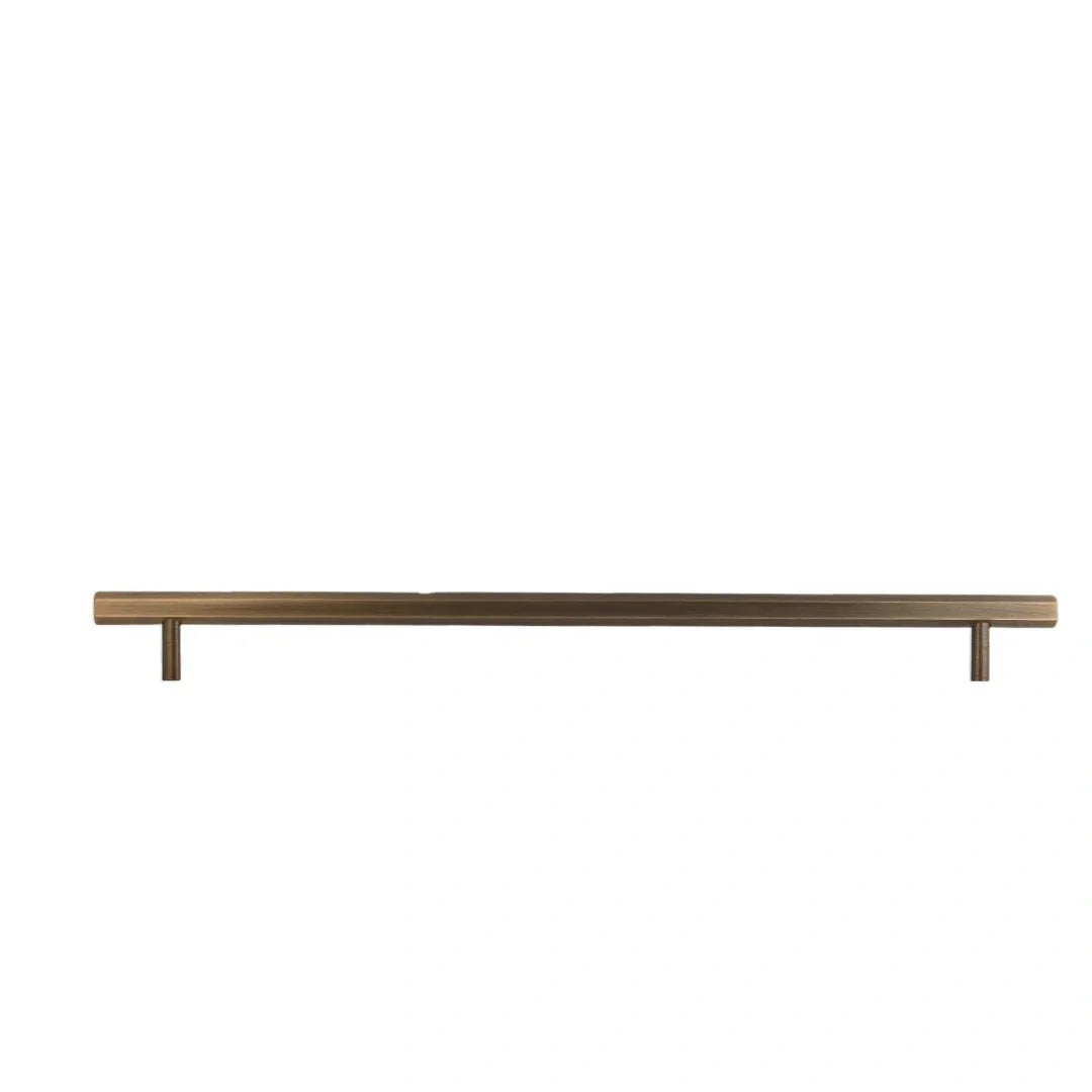 The Mantara B-0052 Oblivion T-Bar Handle is a modern solid brass handle in matte black, gold, and bronze, ideal for cabinets, kitchens, bedrooms, and drawers.