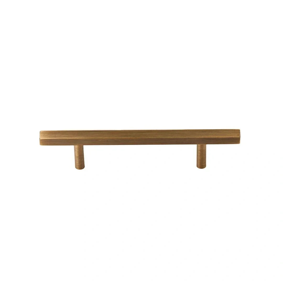 The Mantara B-0052 Oblivion T-Bar Handle is a modern solid brass handle in bronze, ideal for cabinets and kitchens.
