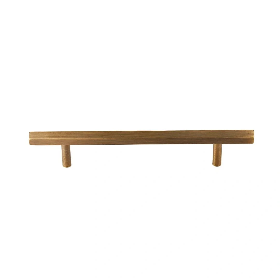 The Mantara B-0052 Oblivion T-Bar Handle is a modern solid brass handle in bronze, ideal for cabinets and kitchens.