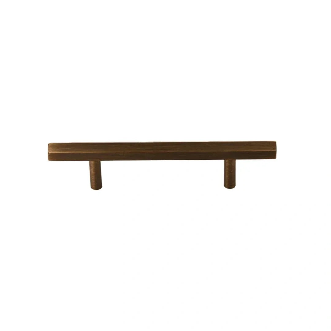 The Mantara B-0052 Oblivion T-Bar Handle is a modern solid brass handle in bronze, ideal for cabinets and kitchens.