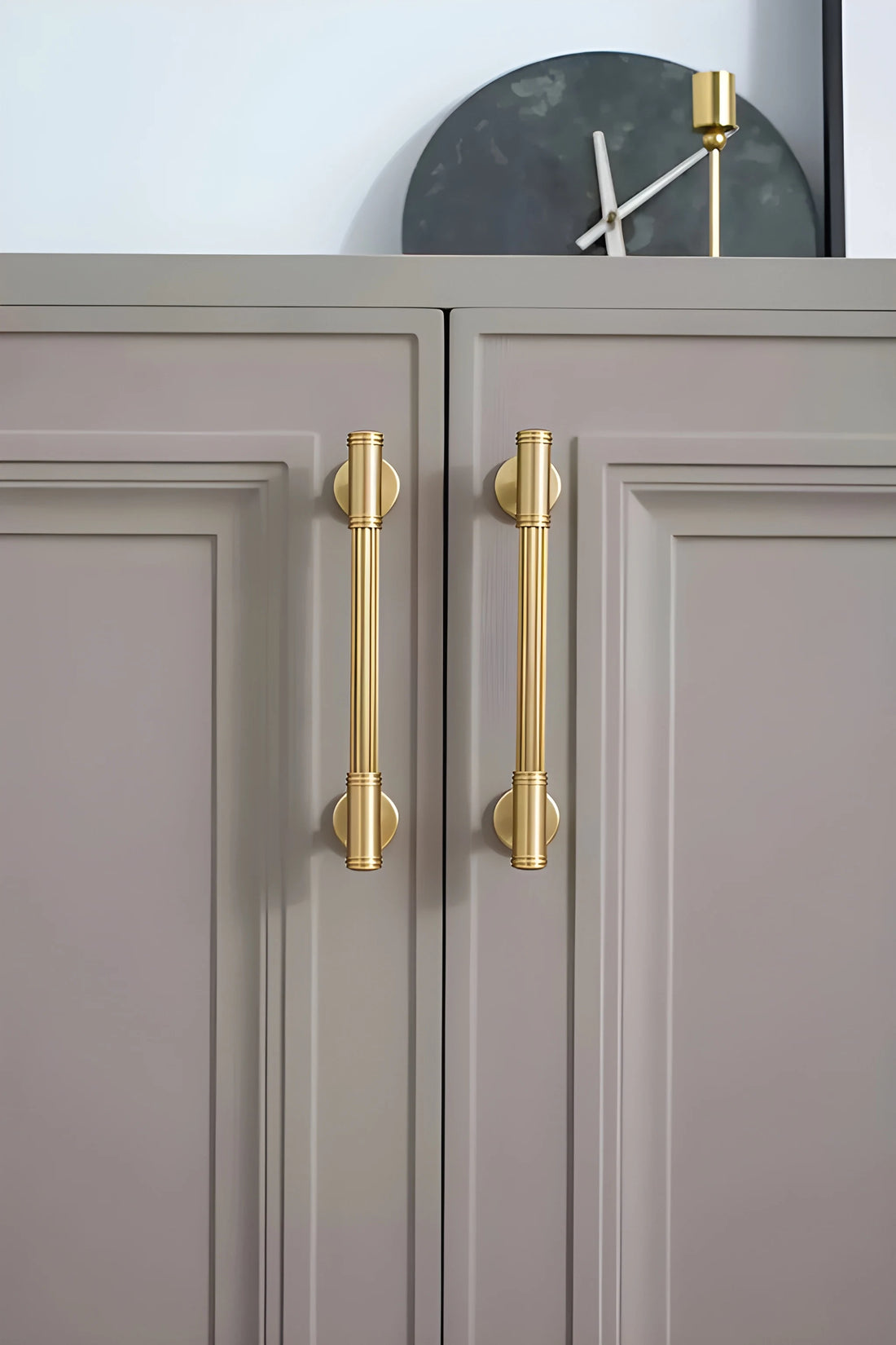 Mantara Olympus Handle B-0098 is a modern solid brass handle in brushed gold, perfect for wardrobes, kitchens, and cabinets.