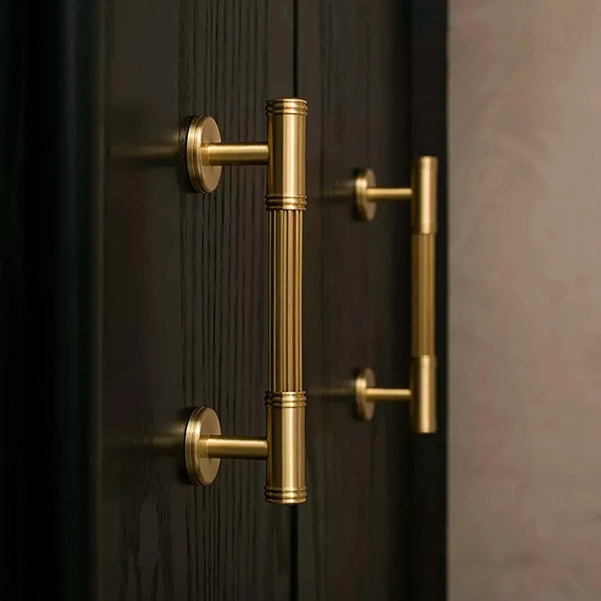 Mantara Olympus Handle B-0098 is a modern solid brass handle in brushed gold, perfect for wardrobes, kitchens, and cabinets.