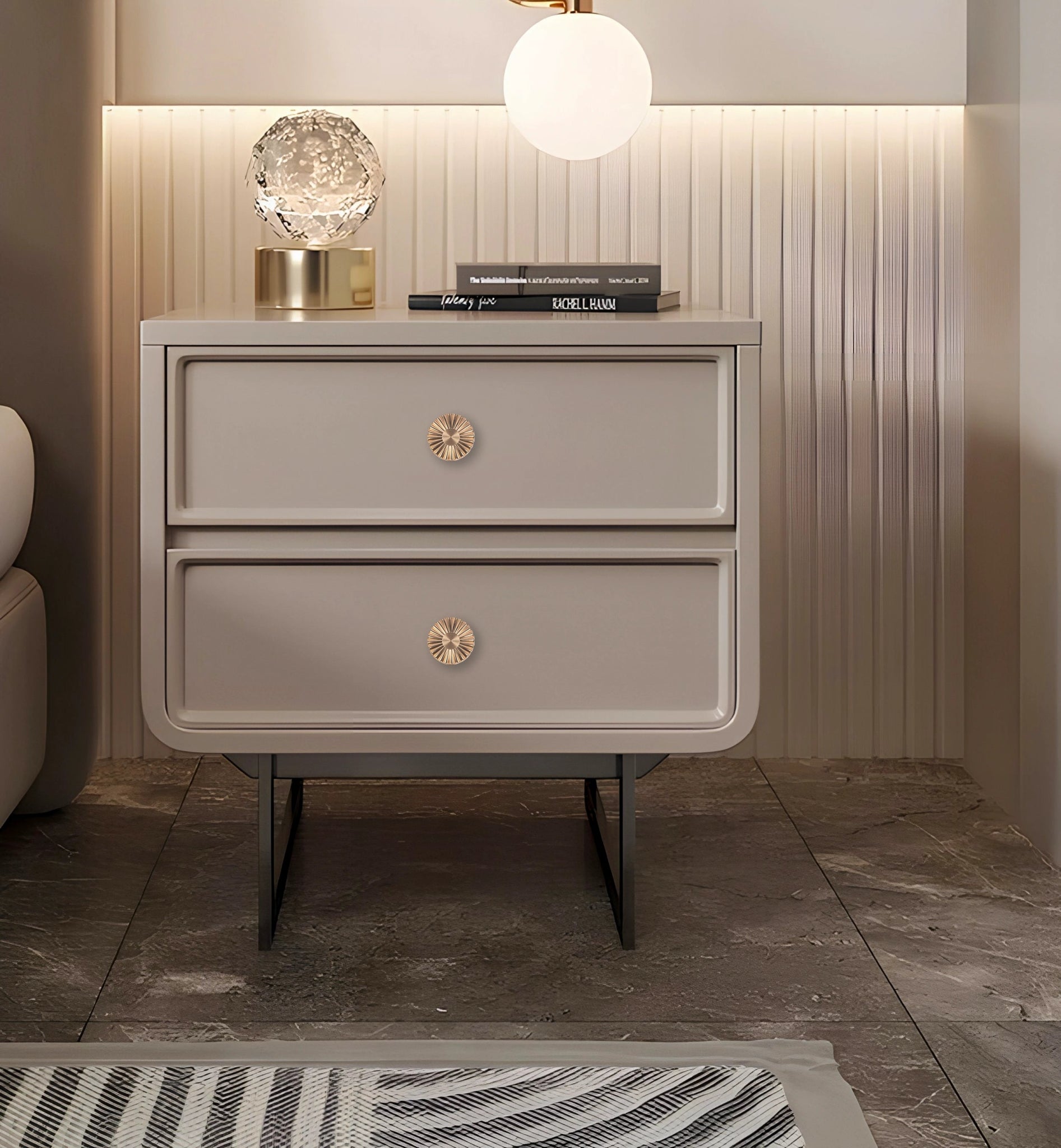 Beige nightstand with two drawers and gold knobs, styled in a warm and minimal room setting—elegant storage by Mantara.