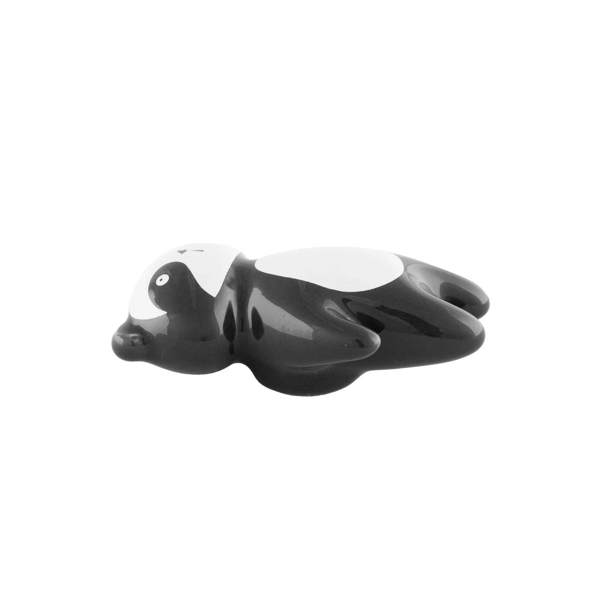 The Mantara CR-0001-Panda Knob is a modern black ceramic knob with a polished finish, perfect for wardrobes, drawers, cabinets, and kids&