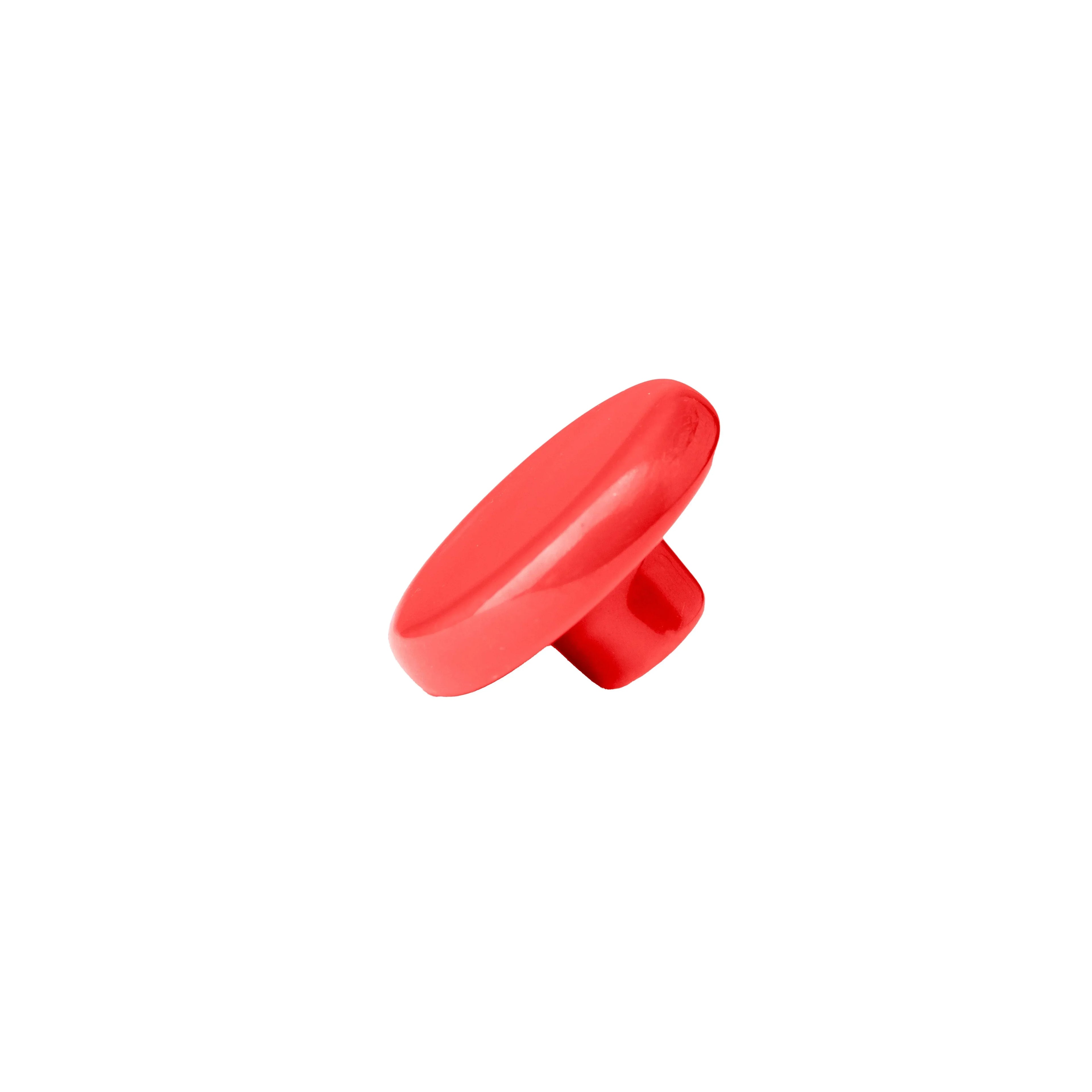 The Mantara CR-0005 Pebble Knob is a modern ceramic knob in red with a polished finish, ideal for wardrobes and drawers.