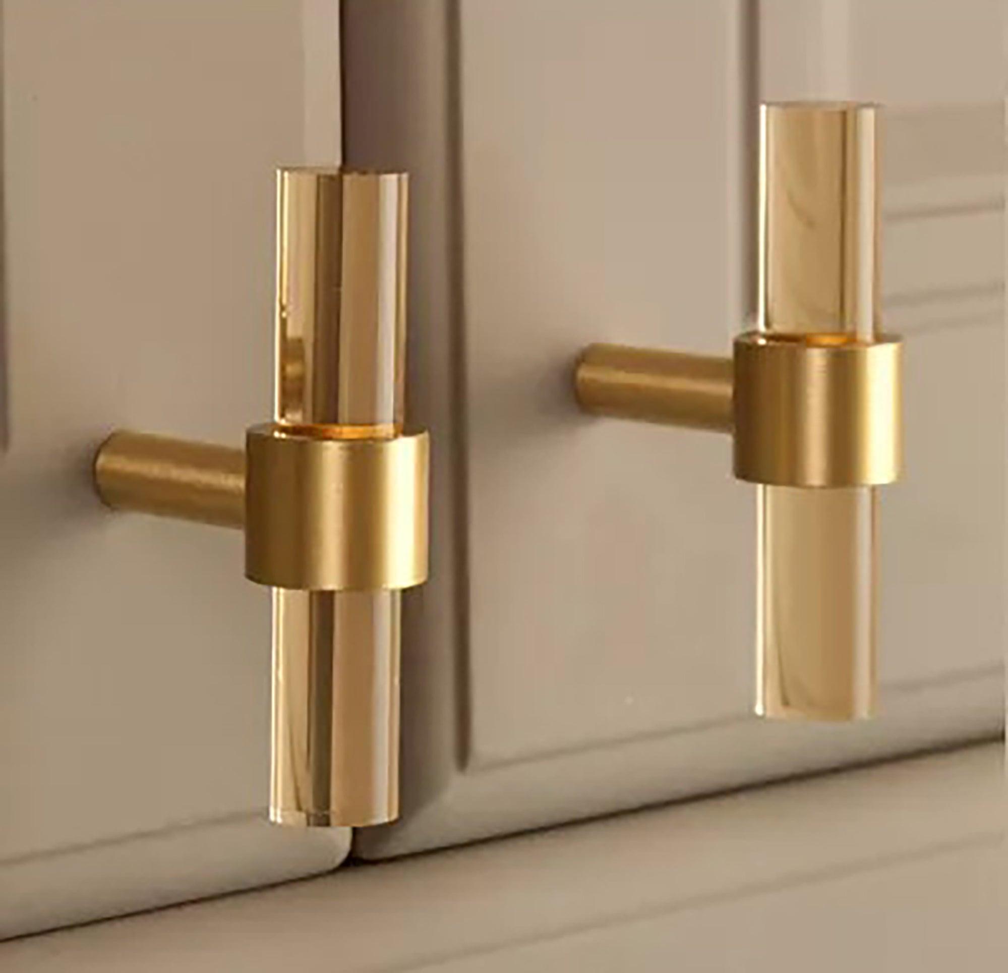 A stylish T-bar cabinet handle, Petra I made of clear acrylic and brushed brass in dark brown finish, model A-0007 by Mantara, A-0007.