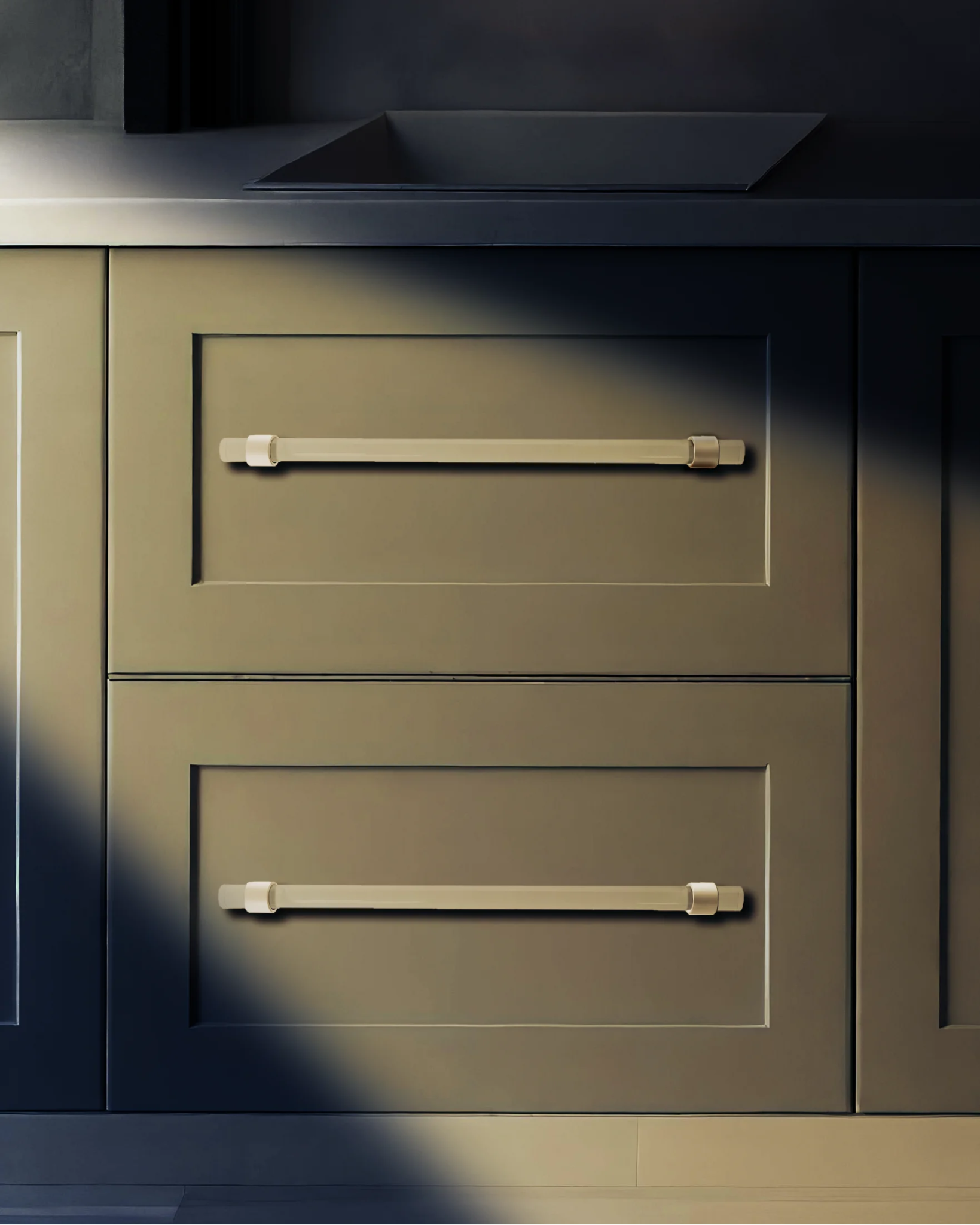 A sleek bar handle, Petra III made of acrylic with polished brass mounts in white finish, model A-0009 by Mantara, SKU A-0009.