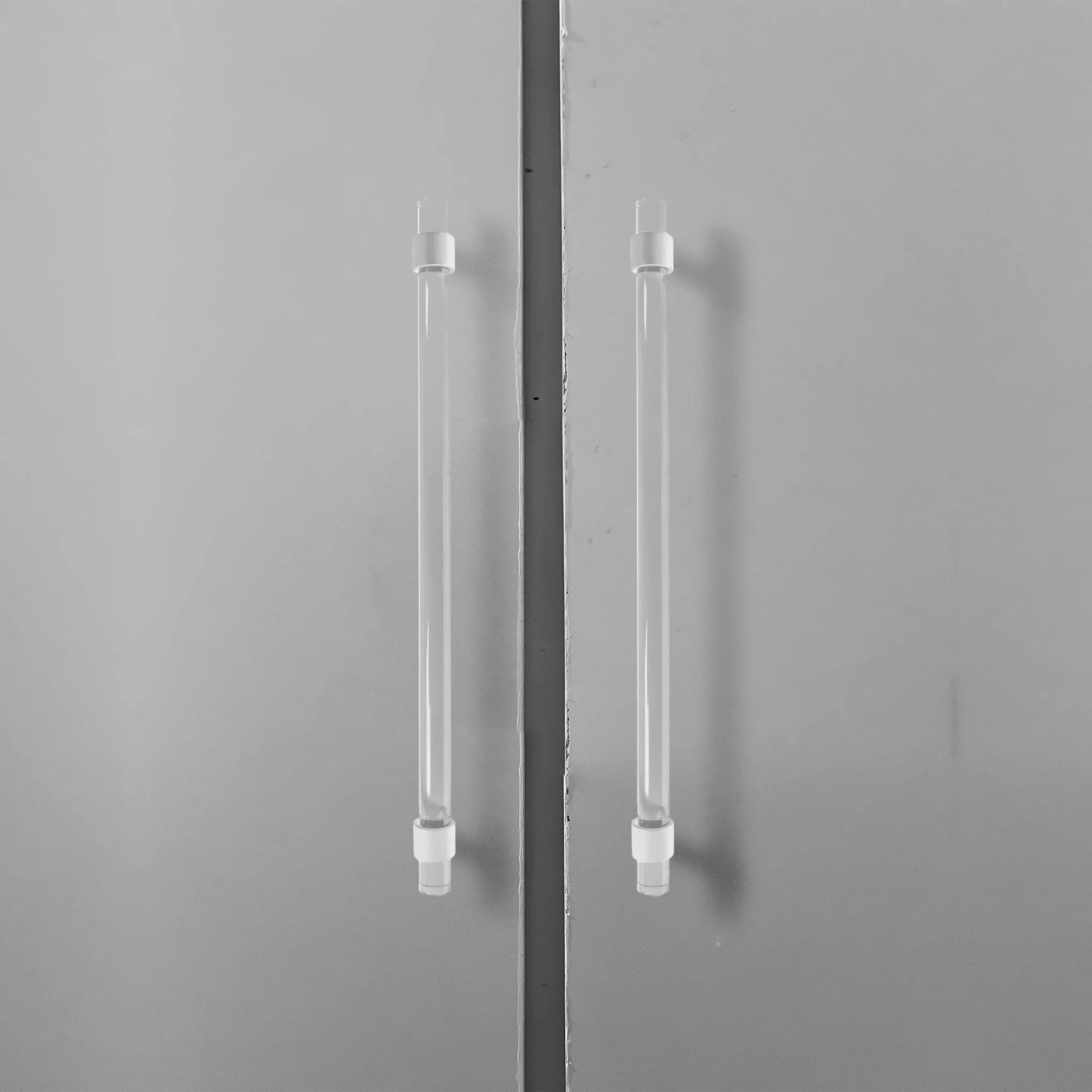 The Mantara A-0009 Petra III Handle is a modern white acrylic handle with polished finish, perfect for kitchens, cabinets, and wardrobes.