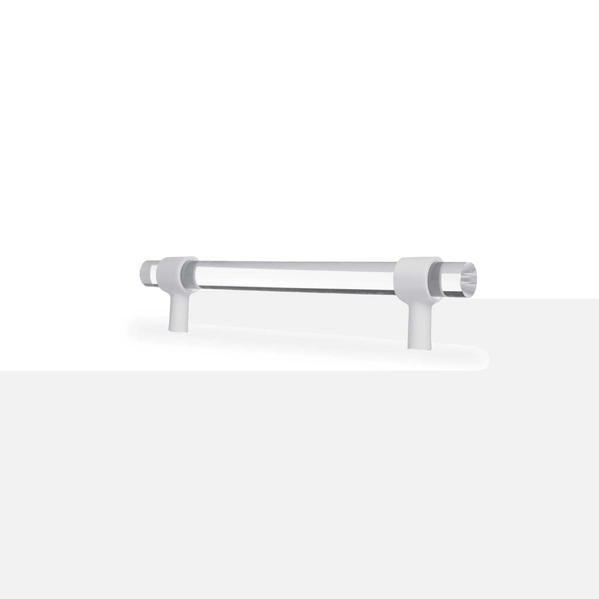 The Mantara A-0009 Petra III Handle is a modern white acrylic handle with polished finish, perfect for kitchens, cabinets, and wardrobes.