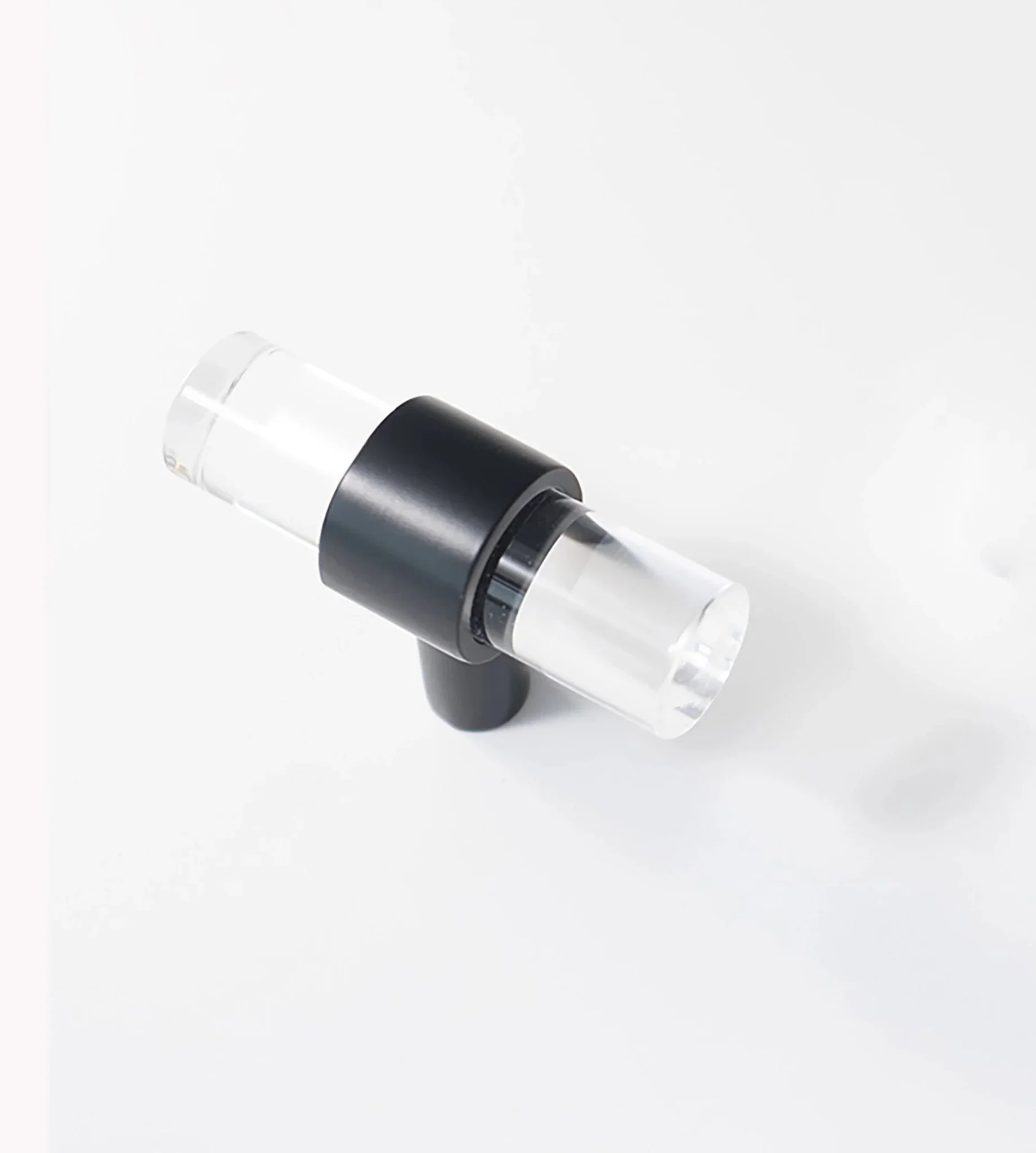 An elegant cabinet bar handle, Petra IV crafted from acrylic in polished black finish, model A-0010 by Mantara, A-0010.