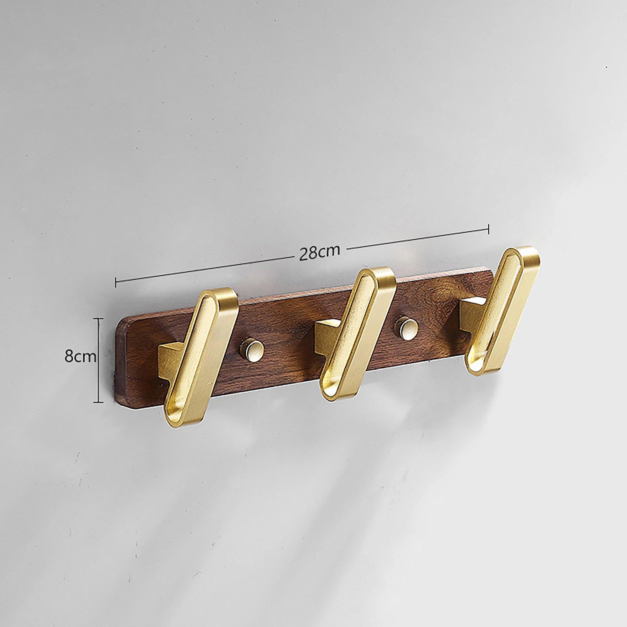 Mantara Plush Hook W-0012 is a modern walnut wood & brass wall hook in gold with brushed finish, ideal for home,Bedrooms & Bathrooms.