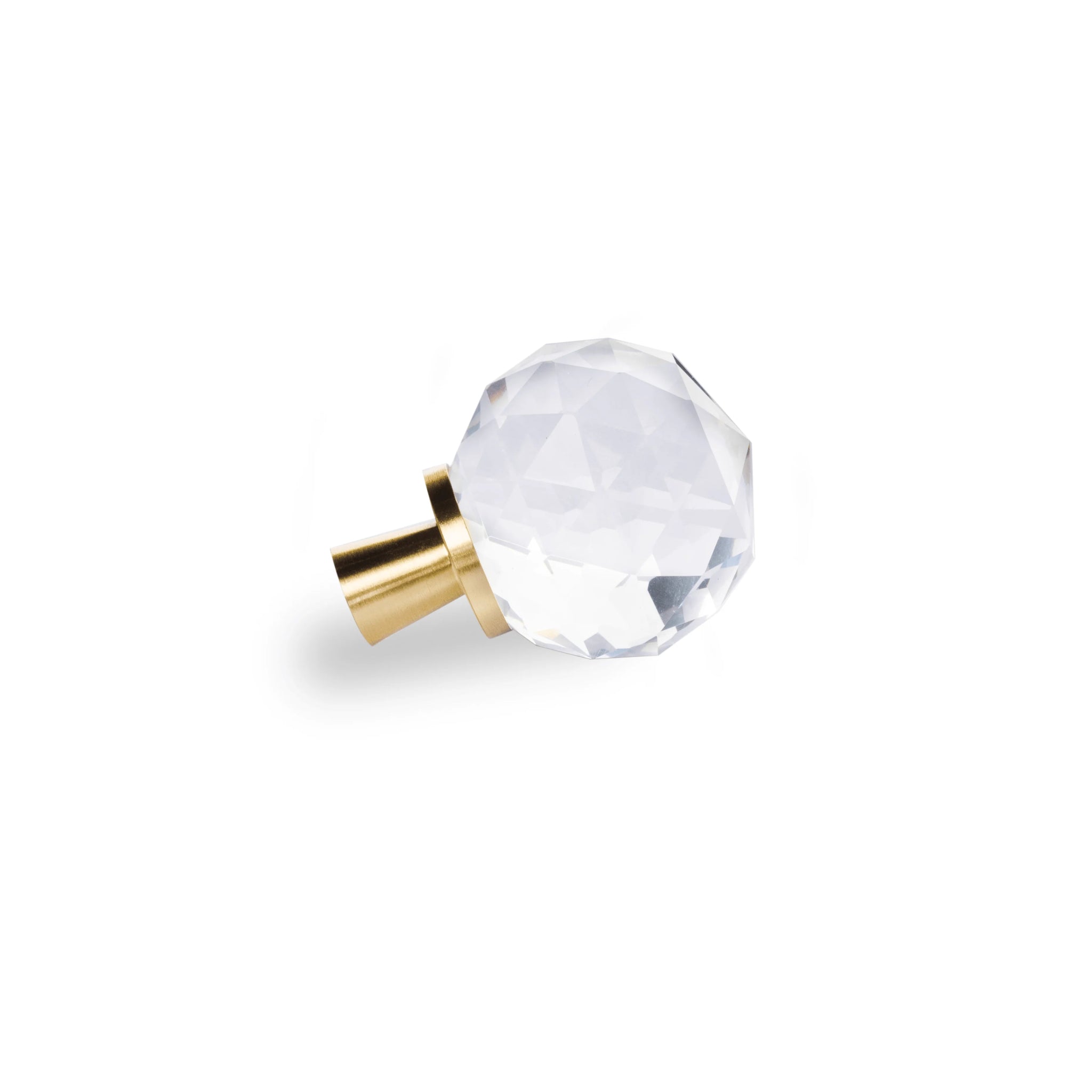 The Mantara C-0016 Quartz Handle is a modern crystal knob in white with polished brass, ideal for wardrobes, cabinets, and kitchens.